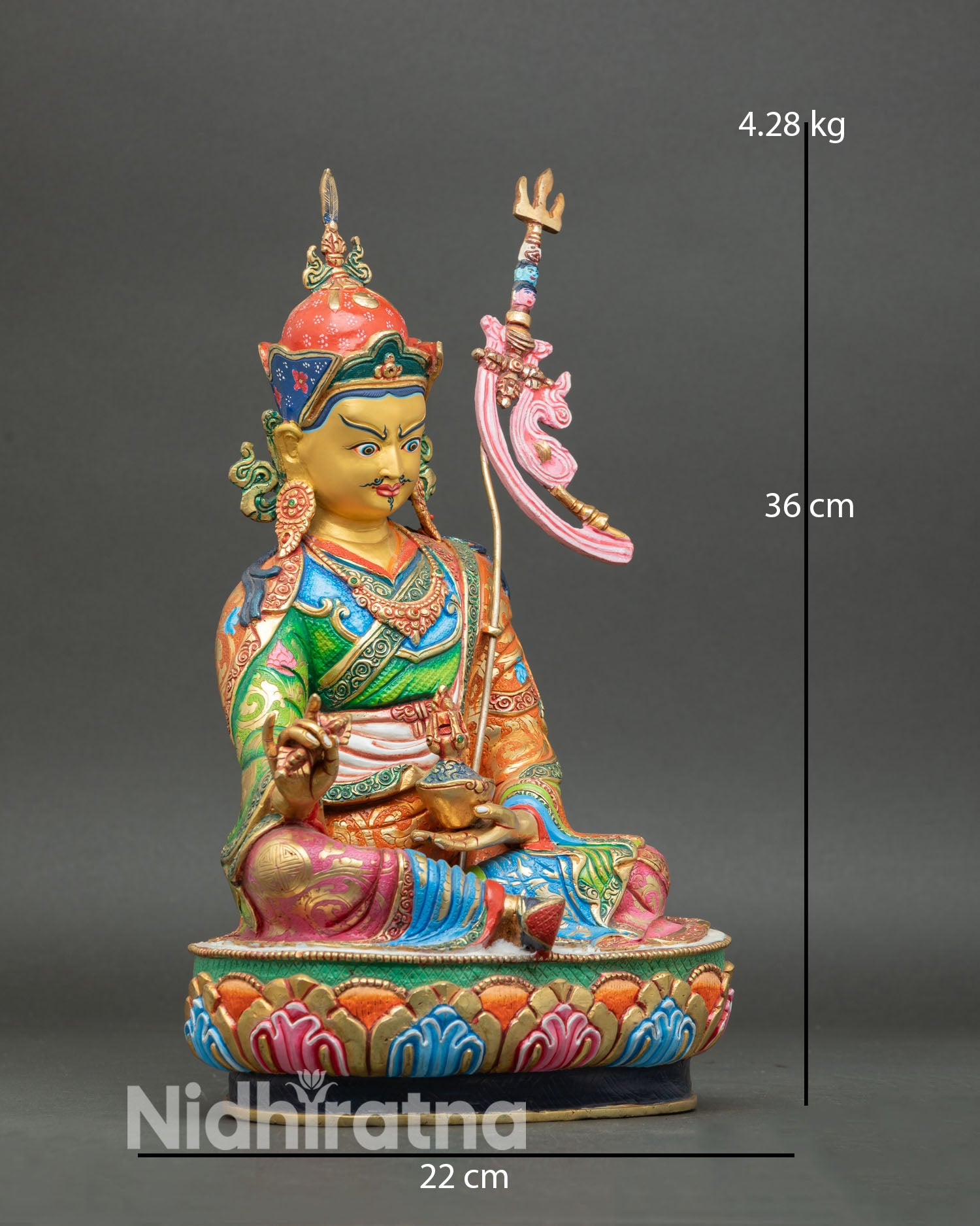 Side view of Padmasambhava statue seated on a lotus pedestal in meditation posture with 3D carved copper and hand-painted finish
