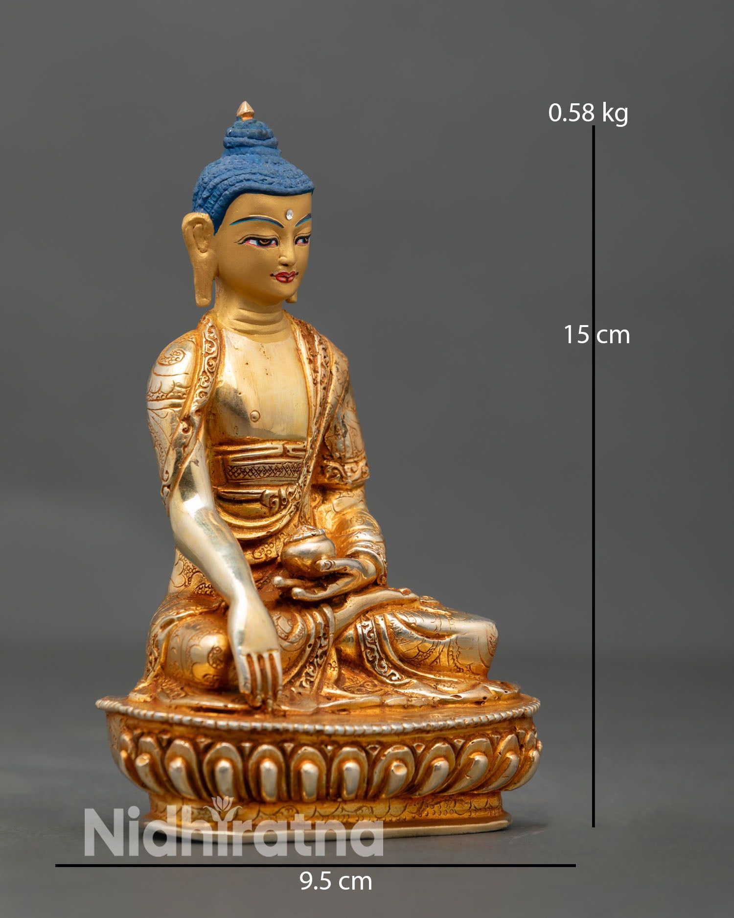 Side view of Shakyamuni Buddha statue bhumisparsha mudra, traditional monastic robe, copper work sculpture