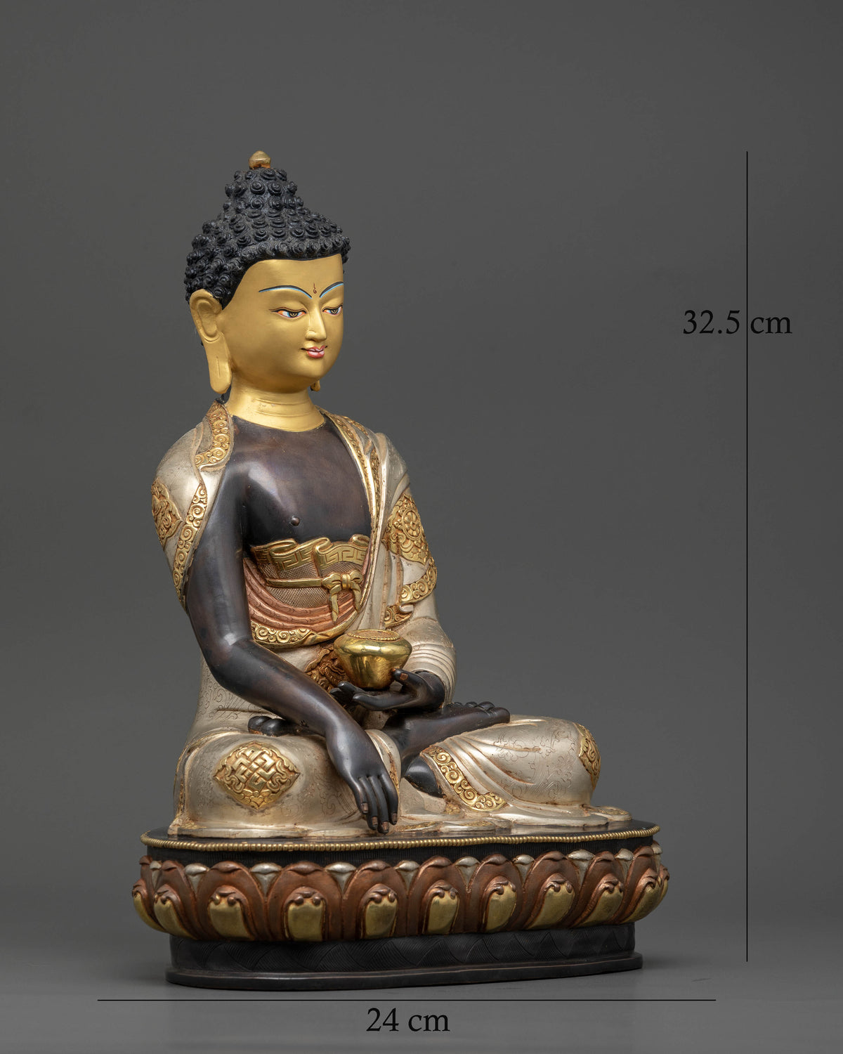 Side View of Shakyamuni Buddha Statue with Gold Painted Face and Alms Bowl