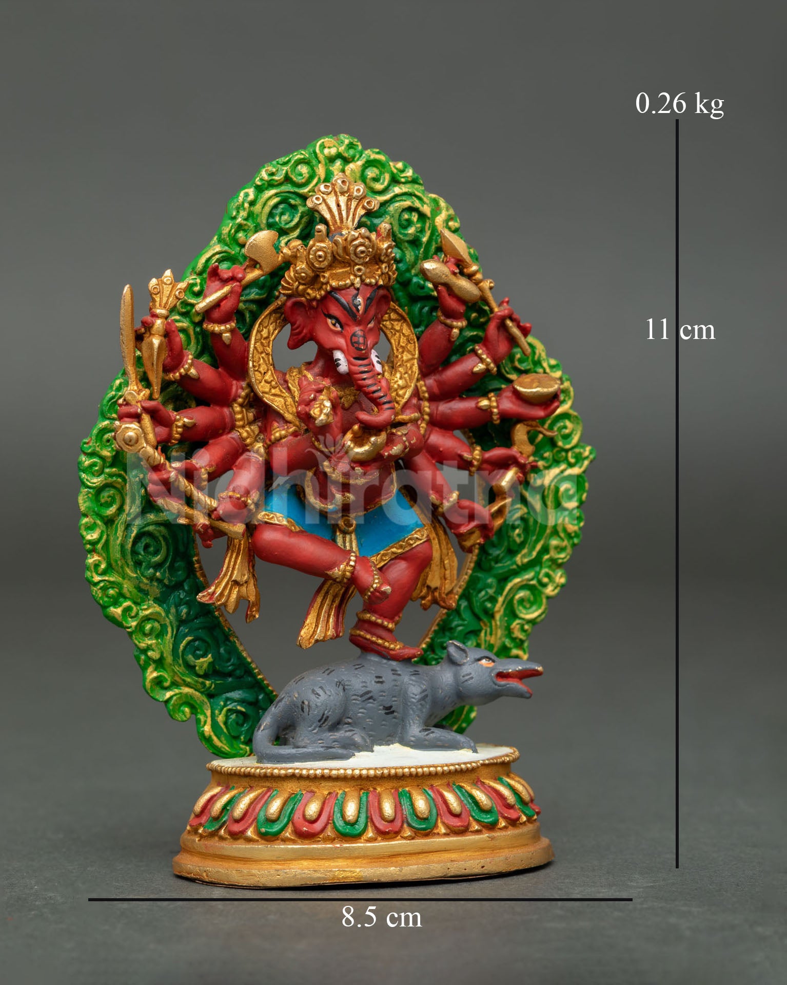 Side view of standing Ganesha statue with raised leg mouse vehicle halo backdrop and finely detailed Nepalese Newari artisan craftsmanship.