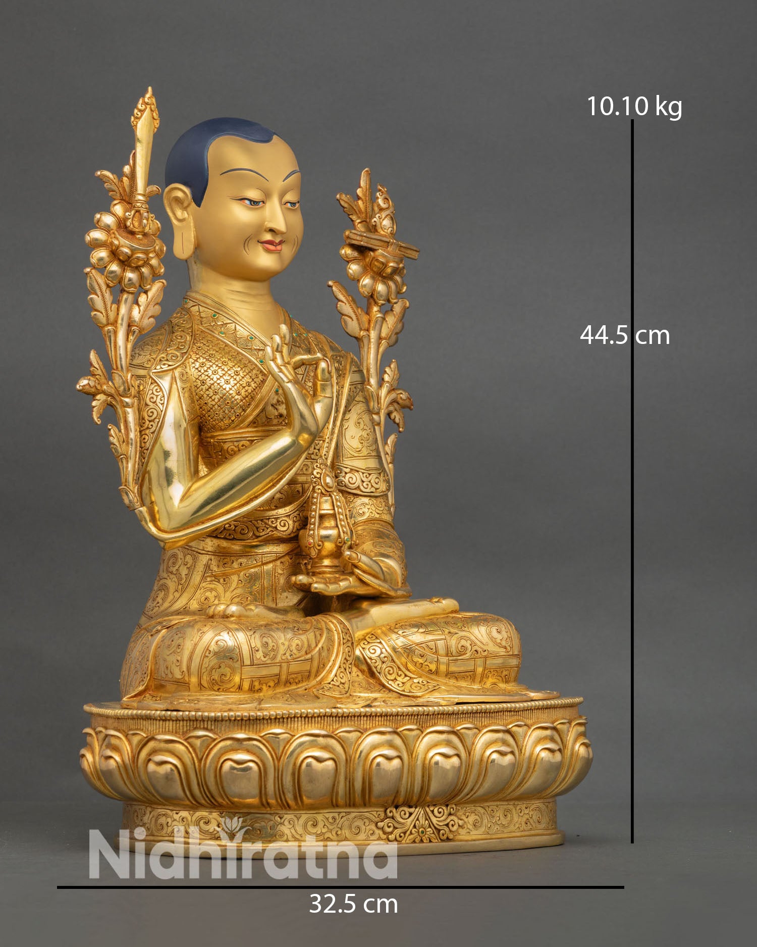 Side view of Tibetan Je Tsongkhapa Buddhist master statue depicting seated lotus posture with wisdom sword sutra and ritual vase elements