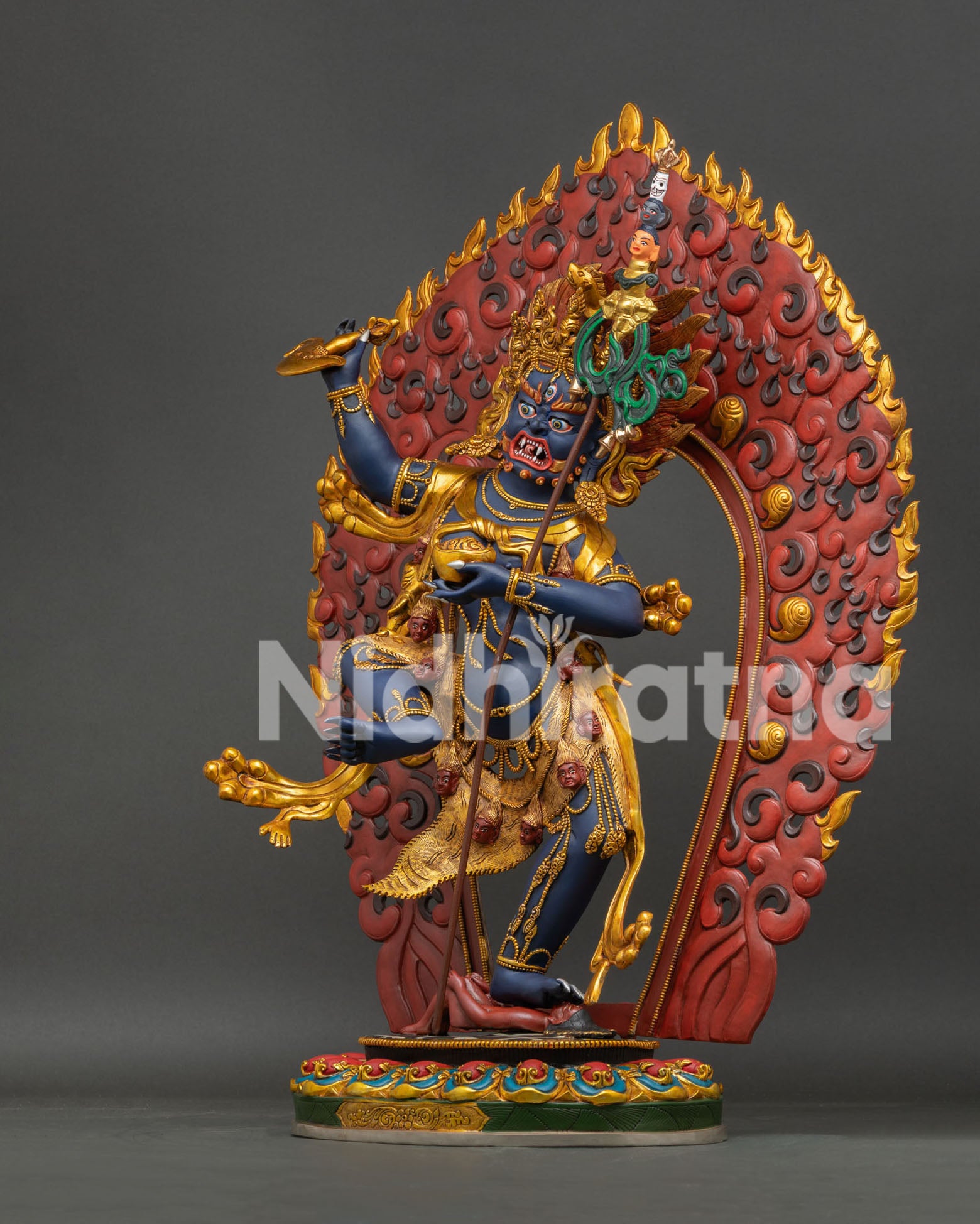 Side view of Troma Nagmo Statue displaying dynamic dancing posture and sacred symbolism.