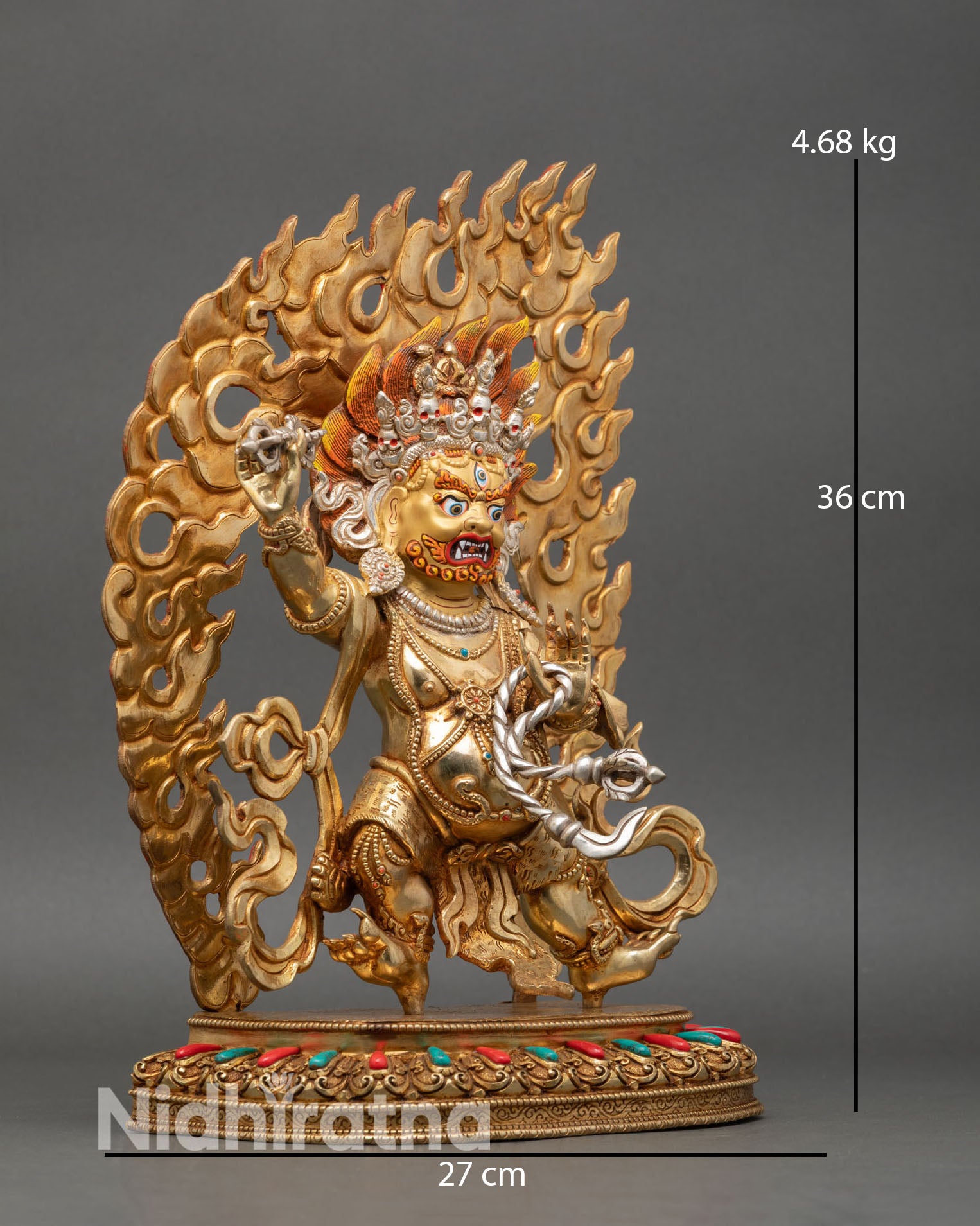 Side view of Vajrapani statue lotus pedestal vajra in right hand lasso in left hand meditation decor