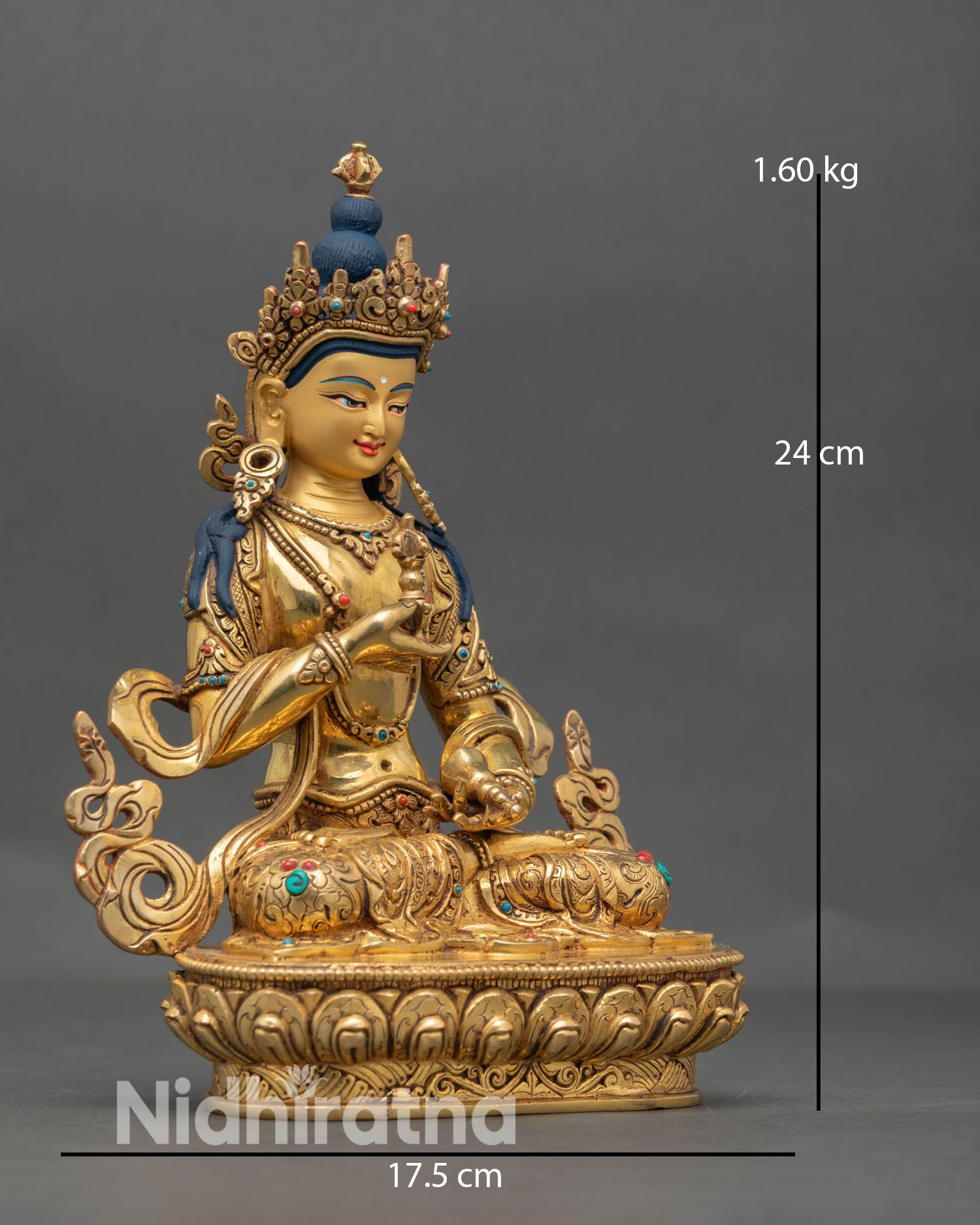 Side view of Vajrasattva Buddhist statue holding vajra and bell symbolizing karma purification, wisdom and compassion in Himalayan art style