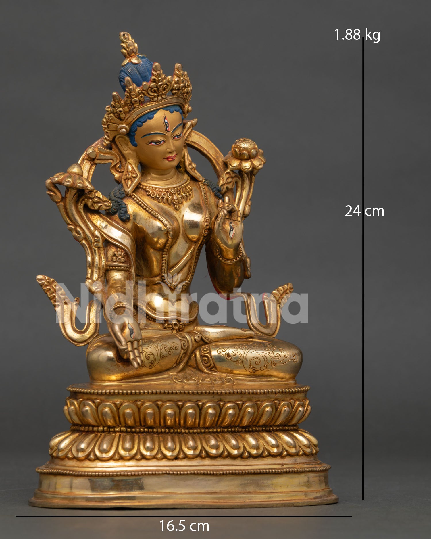 Side view of White Tara Bodhisattva statue showing copper craftsmanship and intricate Buddhist details