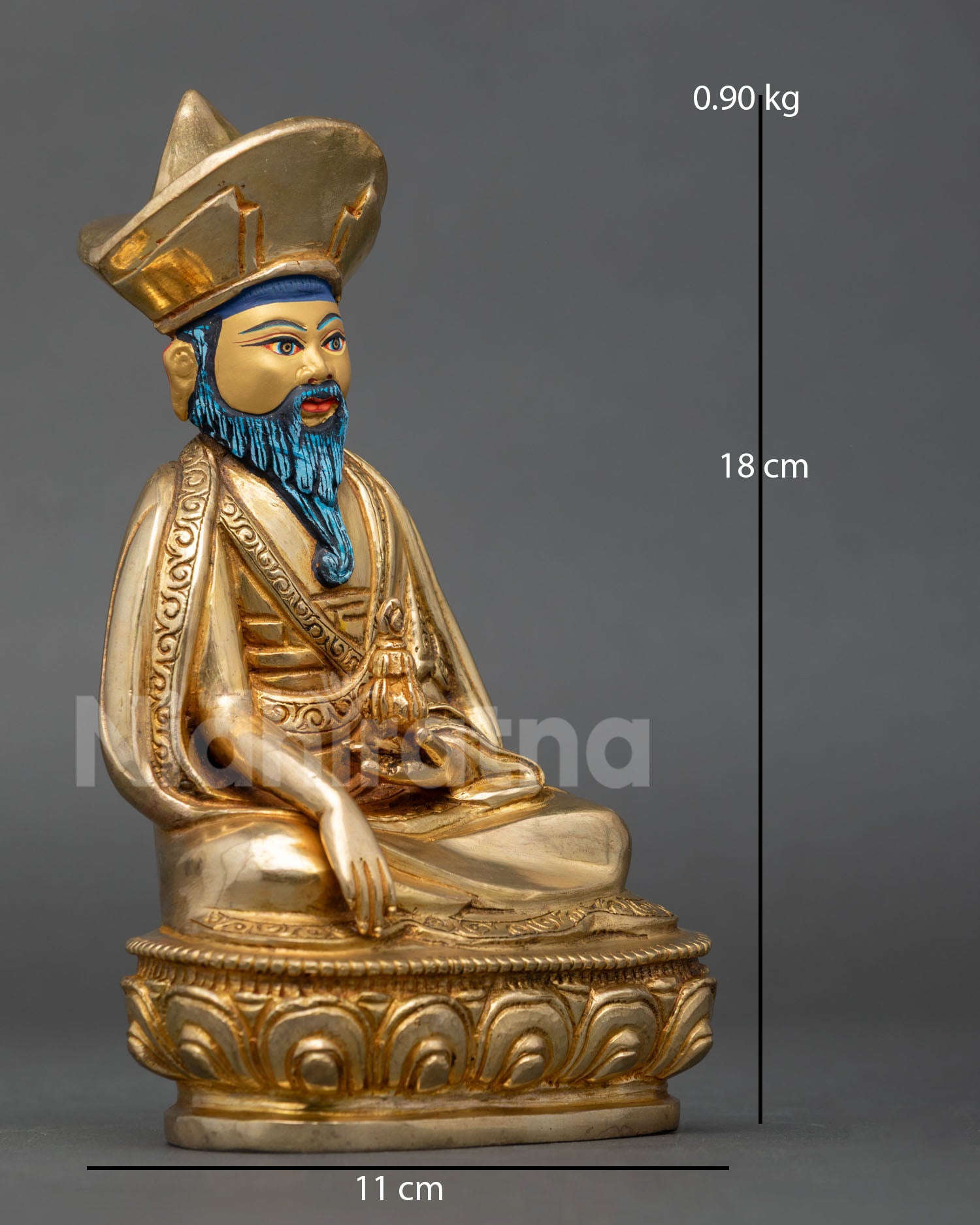 Side view of Zabdrung Rinpoche statue in meditative posture performing earth touching mudra holding ritual vase
