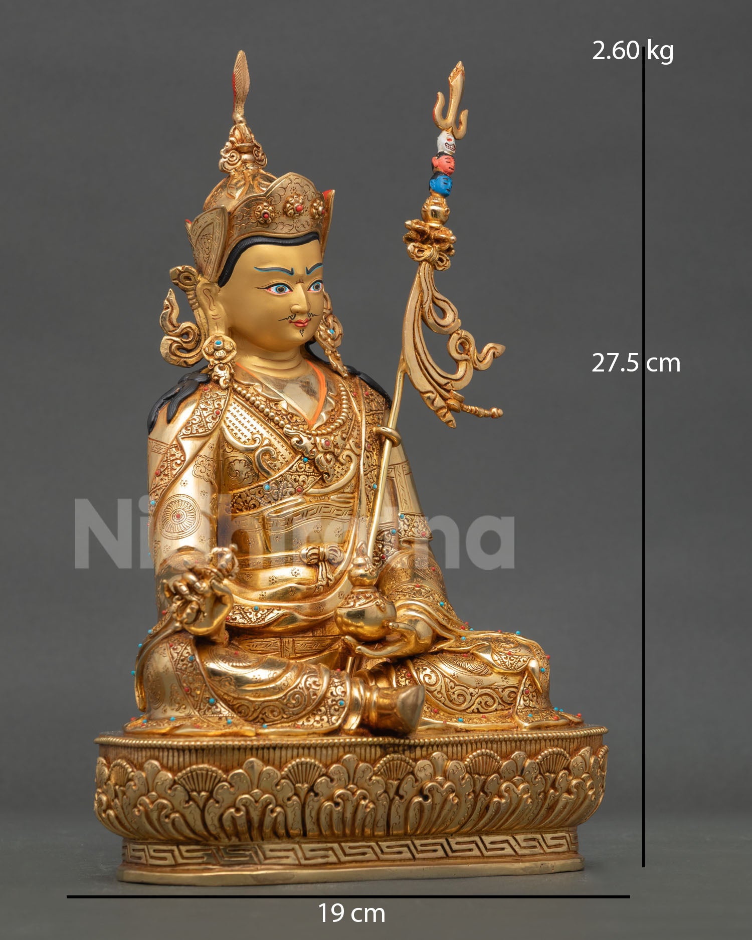 Side view of Padmasambhava statue seated on lotus with sacred objects and intricate copper artwork from Nepal
