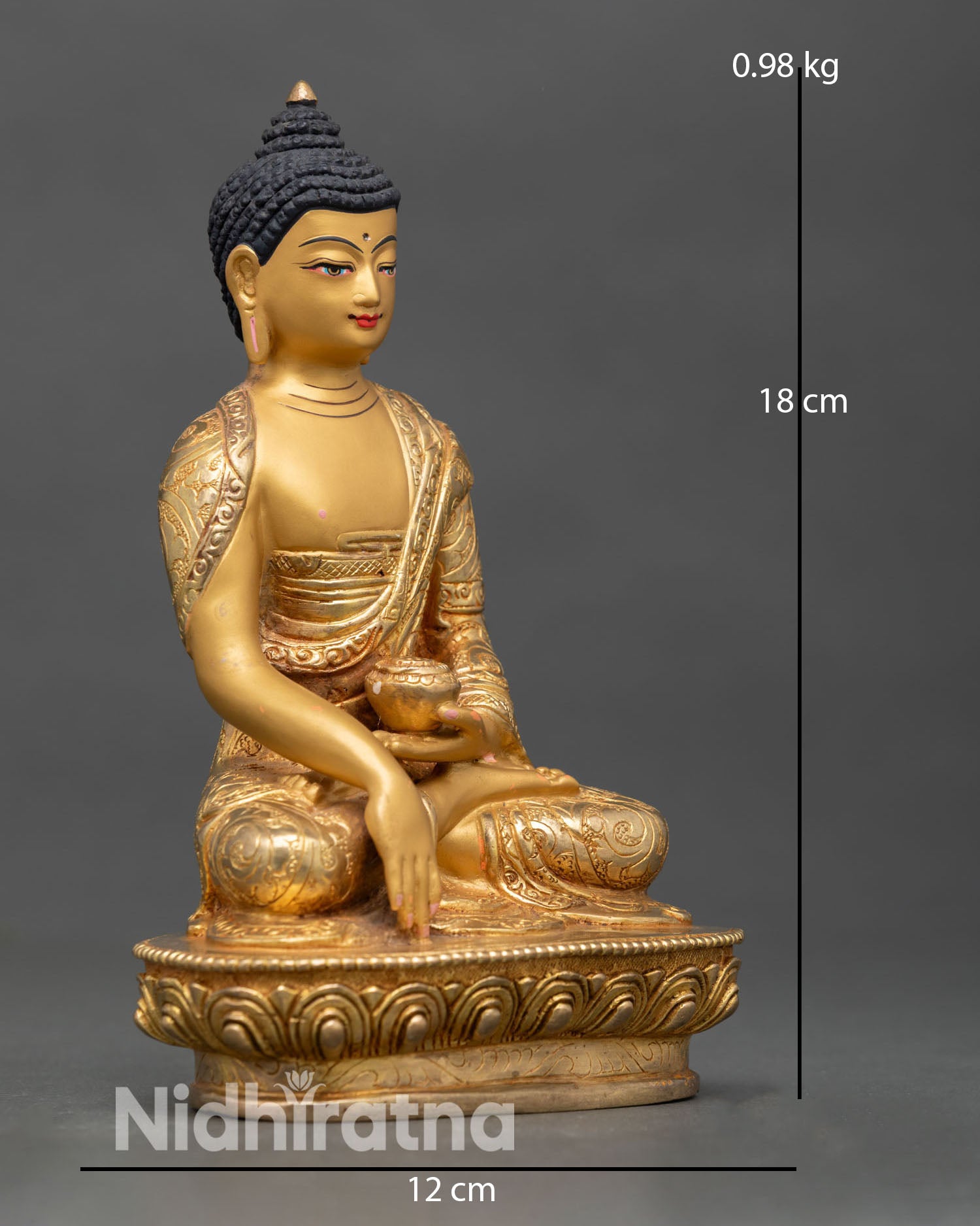 Side view of Shakyamuni Buddha statue showing detailed copper craftsmanship gold gilded accents and flowing monastic robe with refined artistic detailing