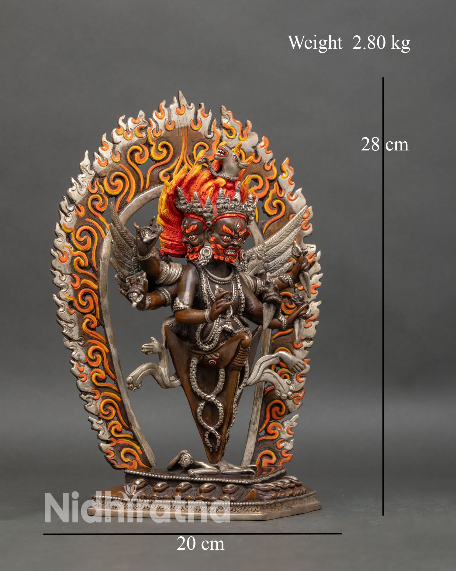 Side view Vajrakilaya statue dynamic posture phurba wings protection and transformation