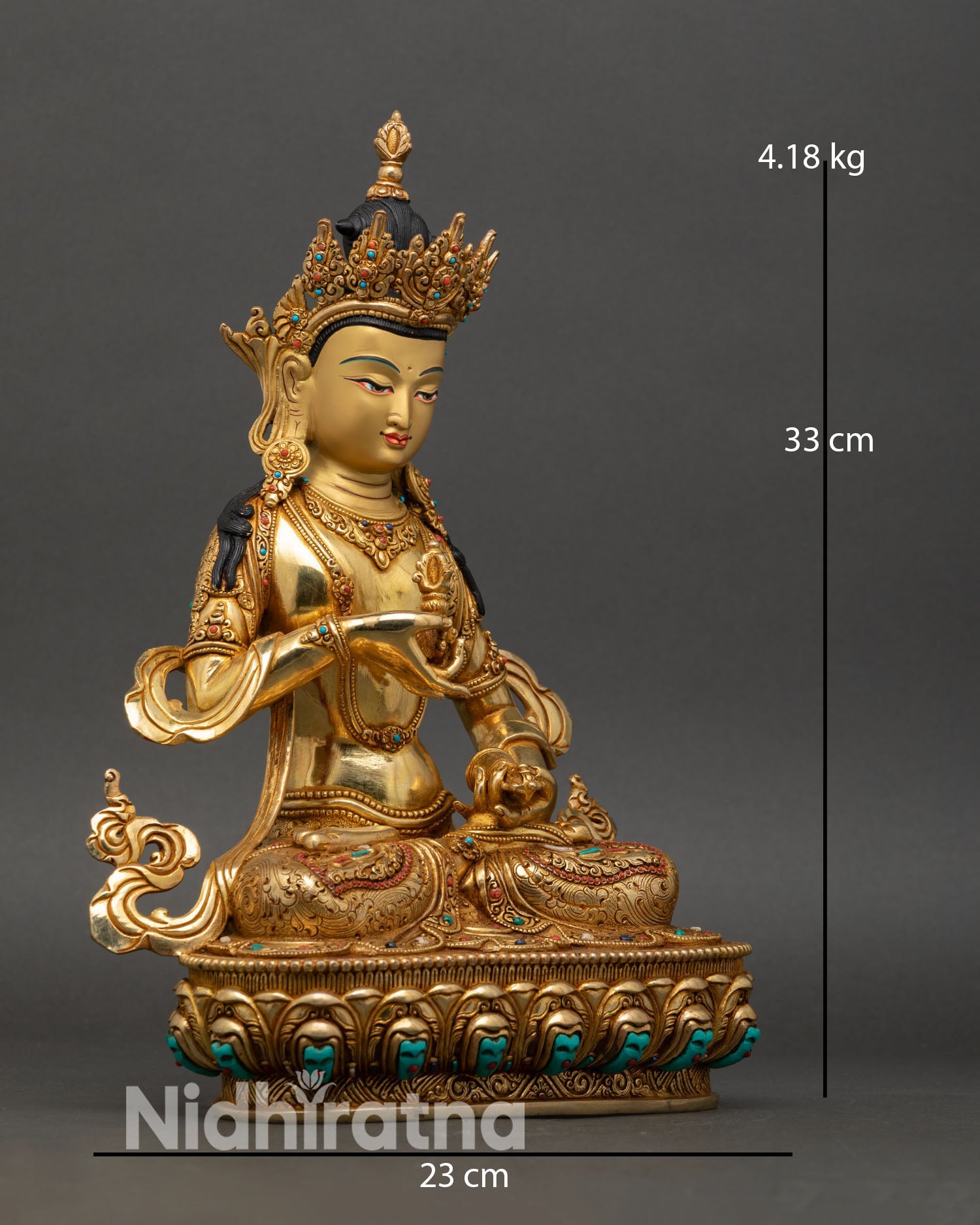 Side view of Vajrasattva statue lotus pedestal holding vajra and bell Tibetan meditation sculpture