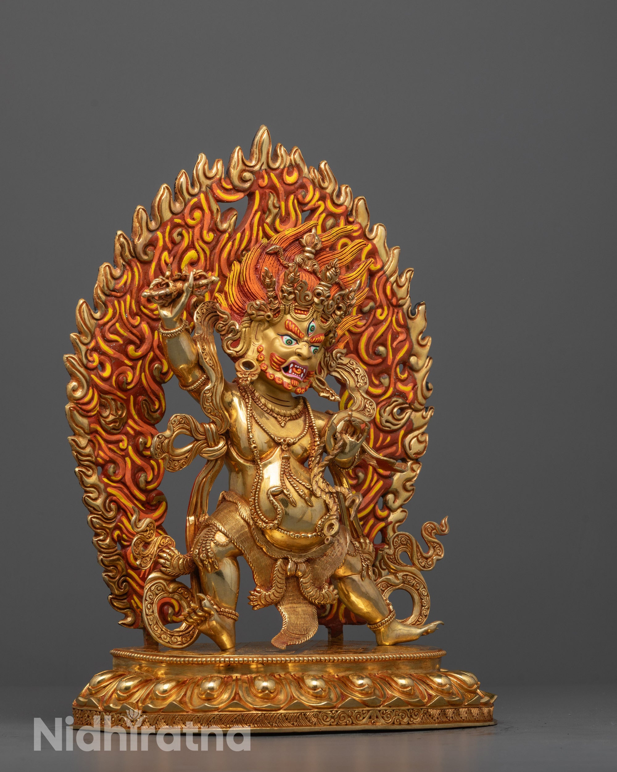 side angle of chana dorje statue with tiger skin garment and lasso detail