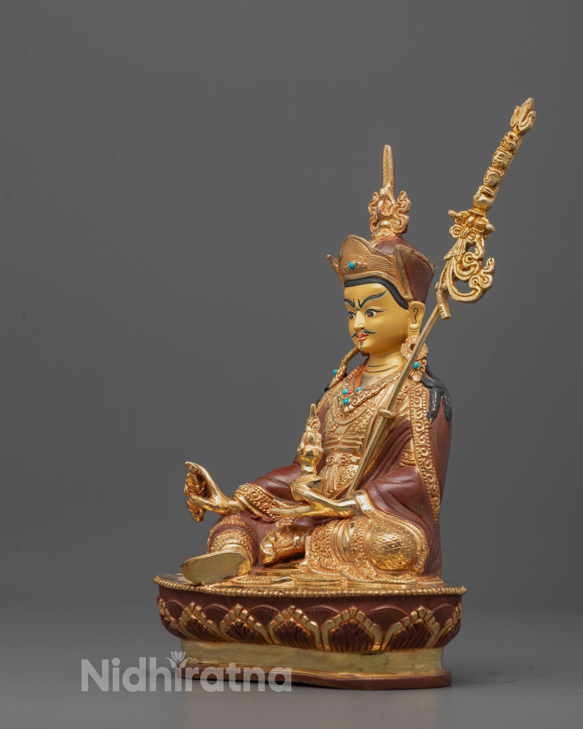 side view Padmasambhava Sculpture showing semi-precious stones and fire-gilded spiritual robes