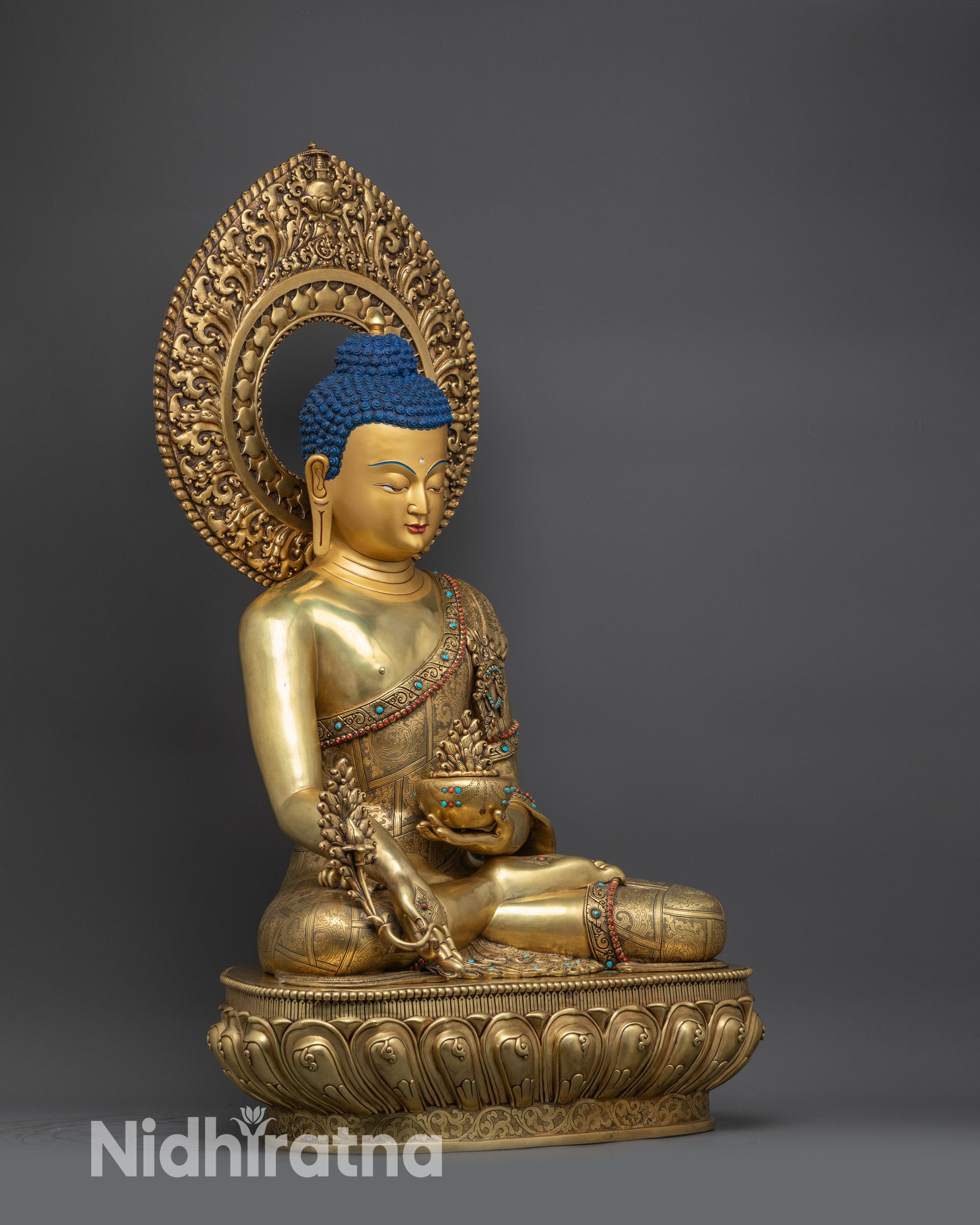 side view of Medicine Buddha Sculpture holding myrobalan vase on lotus throne