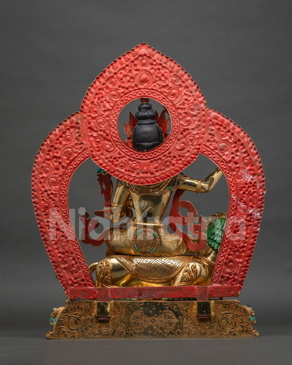 Simhanada Manjushri statue back view, gold-gilded copper halo and Snow Lion detail