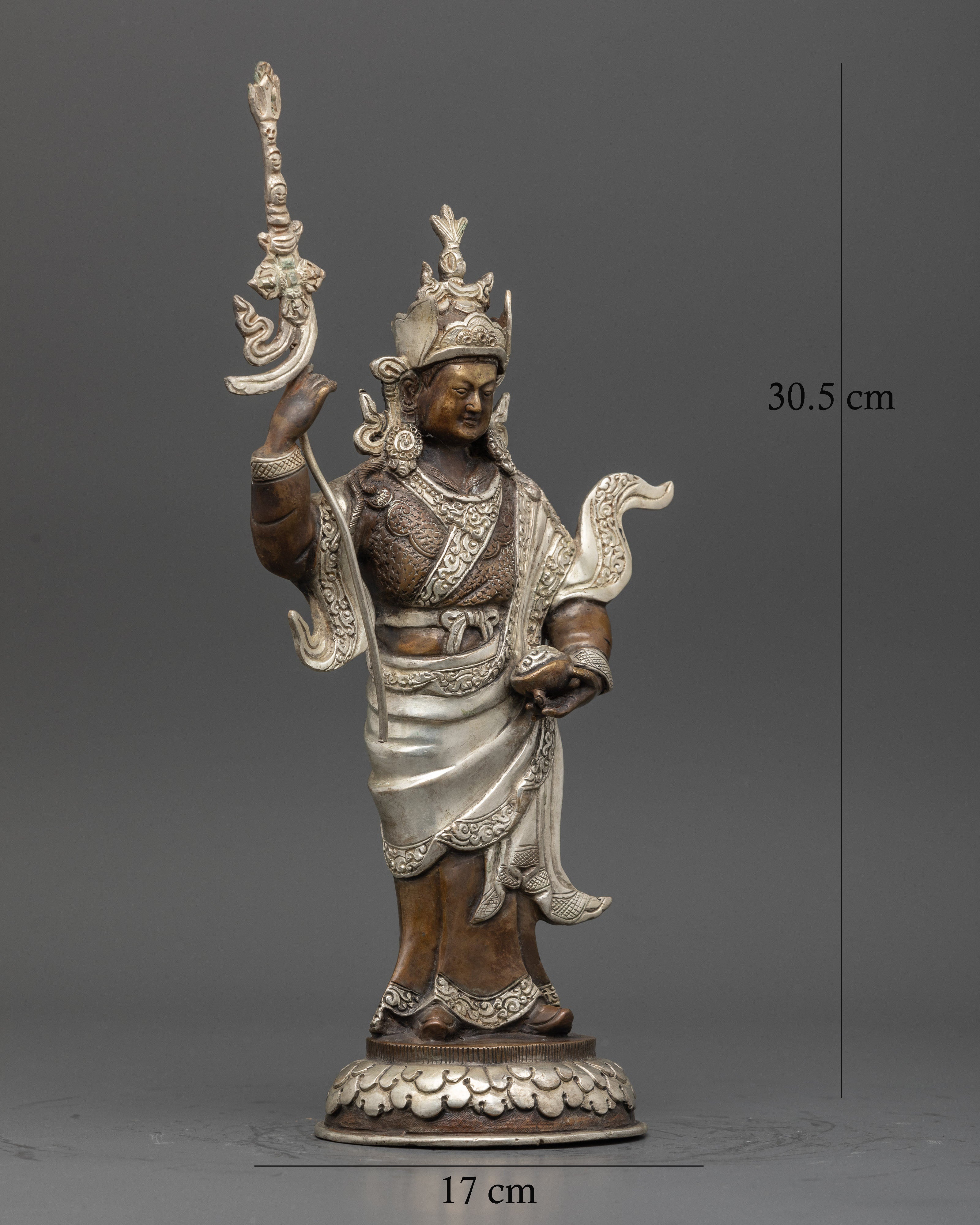 Standing Guru Rinpoche Buddhist sculpture holding trident and kapala skull cup