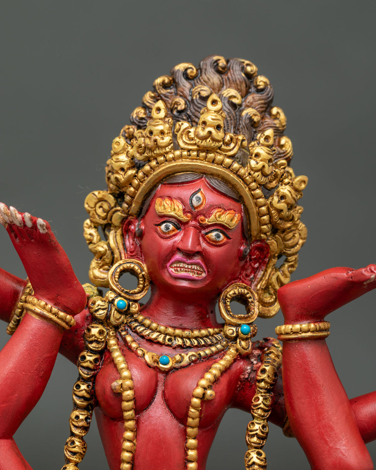 Sukhasiddhi Statue close up gold gilded details semi precious stones.