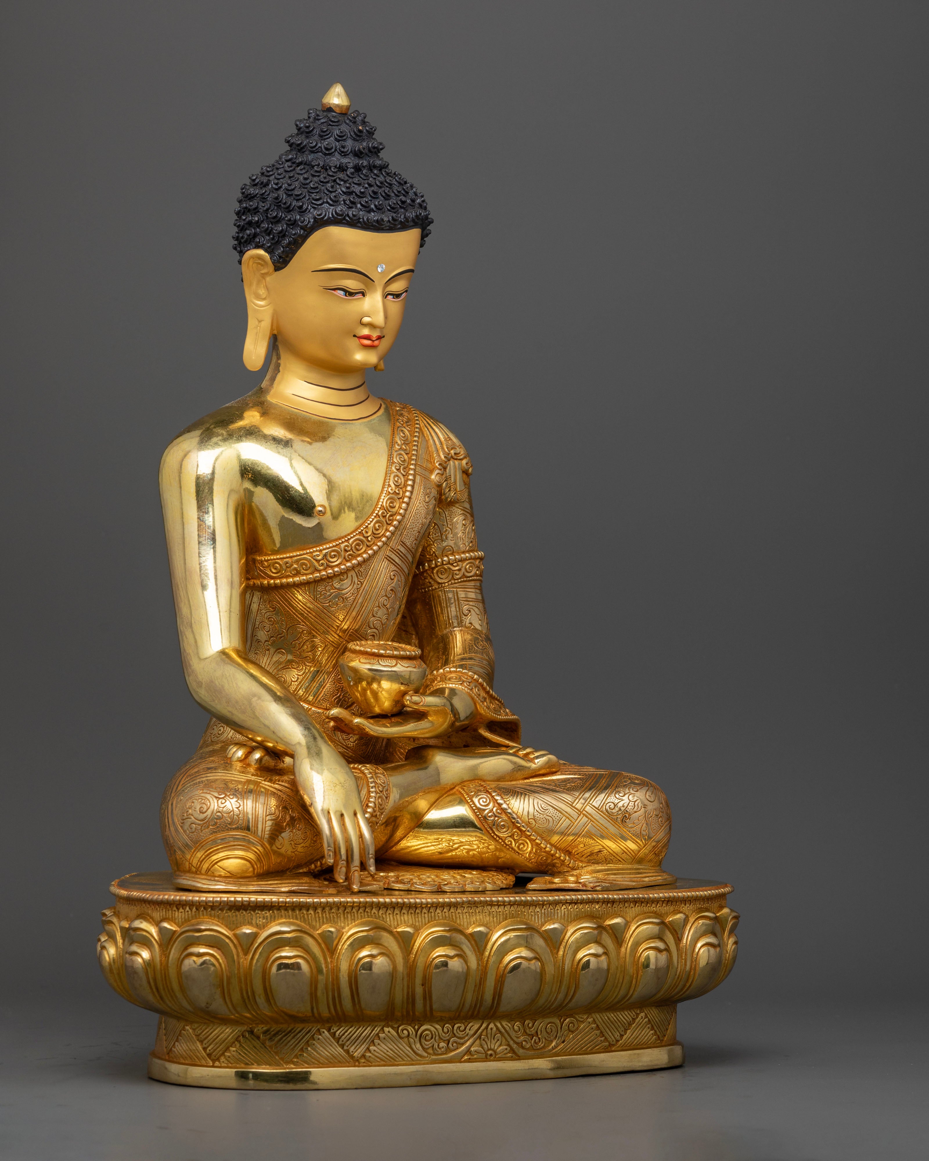 the Buddha Shakyamuni statue, highlighting the fine details, traditional Nepali artistry, and the rich, colorful acrylic work along the robe and ornaments.