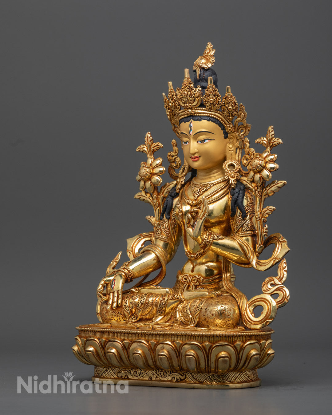the Tibetan White Tara Statue revealing the detailed lotus base and traditional posture representing protection, wisdom, and compassion.