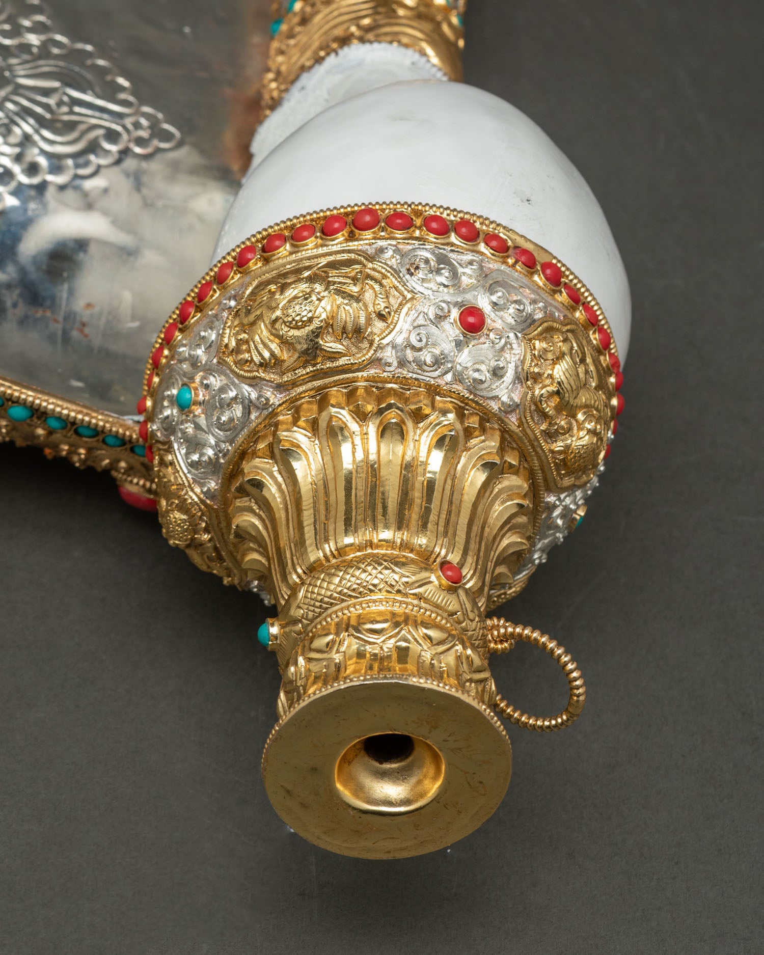 Tibetan Buddhist conch shell handcrafted Himalayan ritual artifact gold plated sacred offering object spiritual home altar decor
