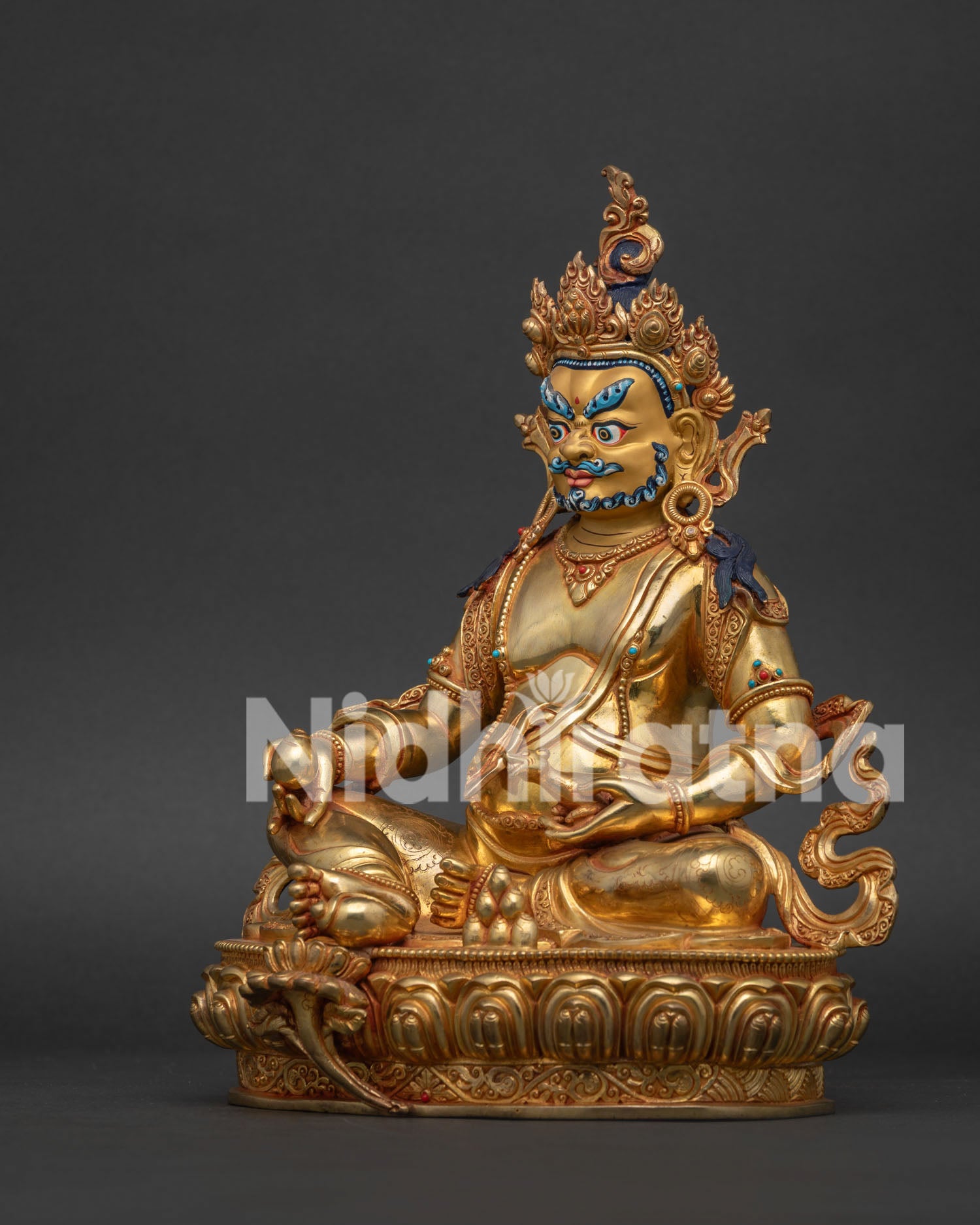 Tibetan Dzambhala wealth deity statue holding mongoose with jewel and citron fruit symbols