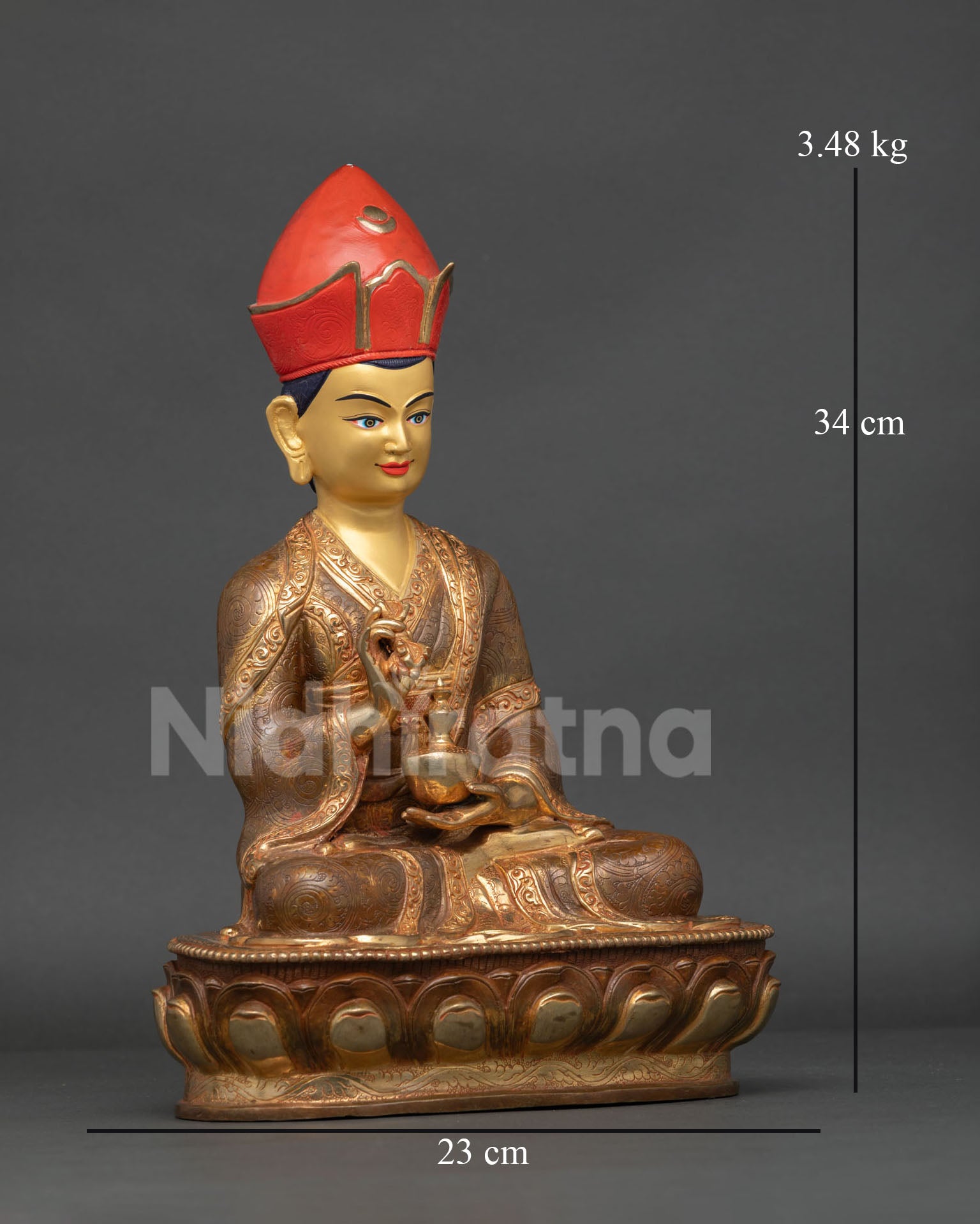 Tibetan Karmapa Buddhist sculpture with gold gilded details and vajra kalash symbols