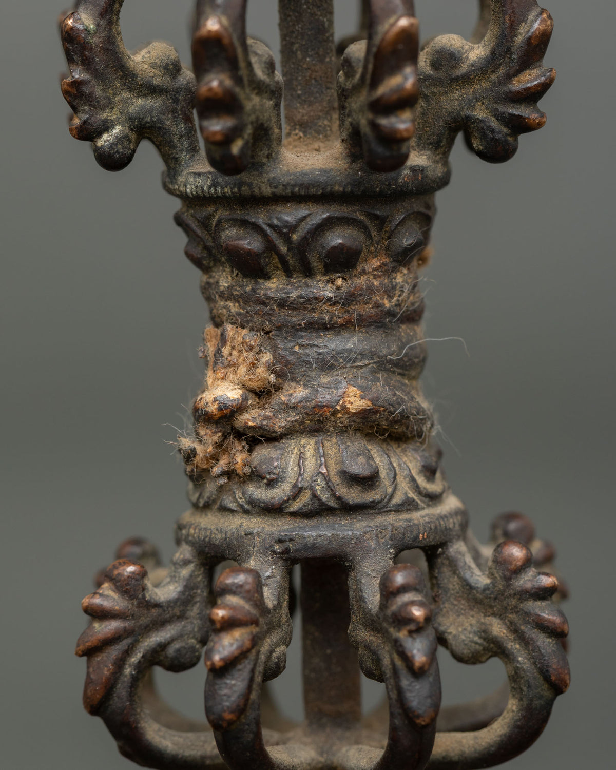 Traditional buddhist vajra with antique copper finish for altar meditation and shrine display.