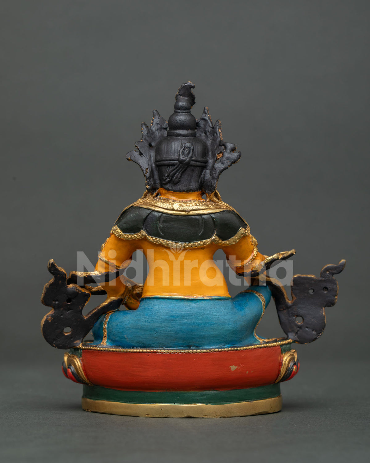 Traditional nepalese dzambhala statue for buddhist altar and meditation space.