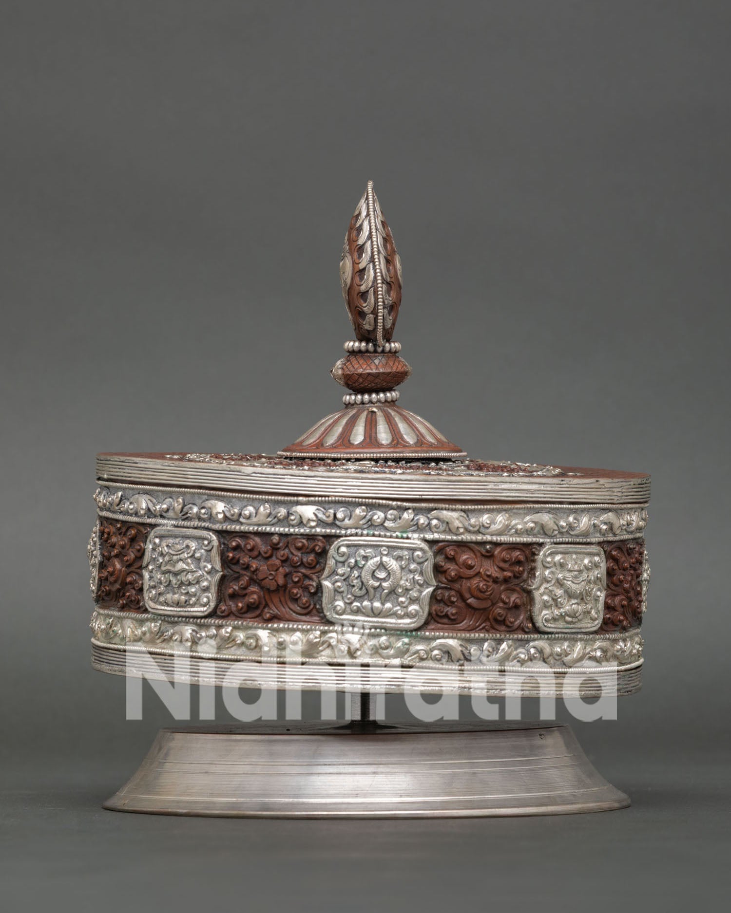 Traditional Tibetan Prayer Wheel with Flame Jewel Finial and Auspicious Engravings
