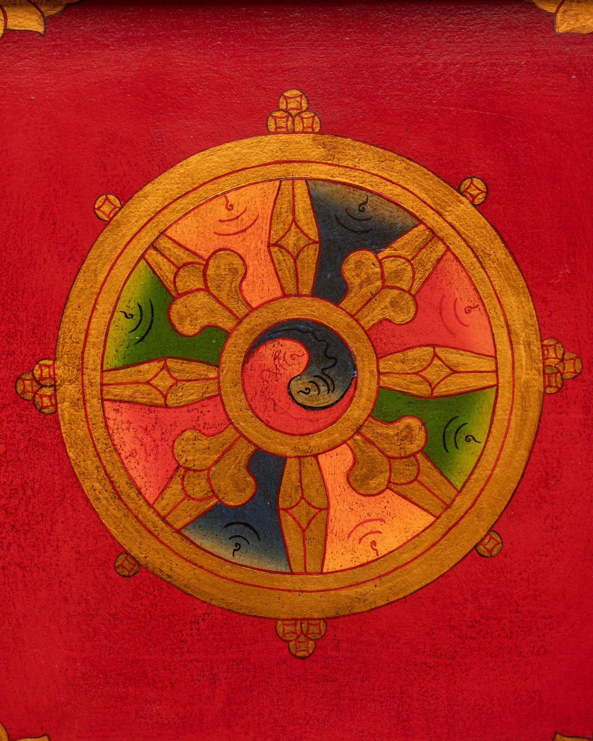 Traditional Tibetan wooden tray with Dharma Chakra motif for Buddhist altar.
