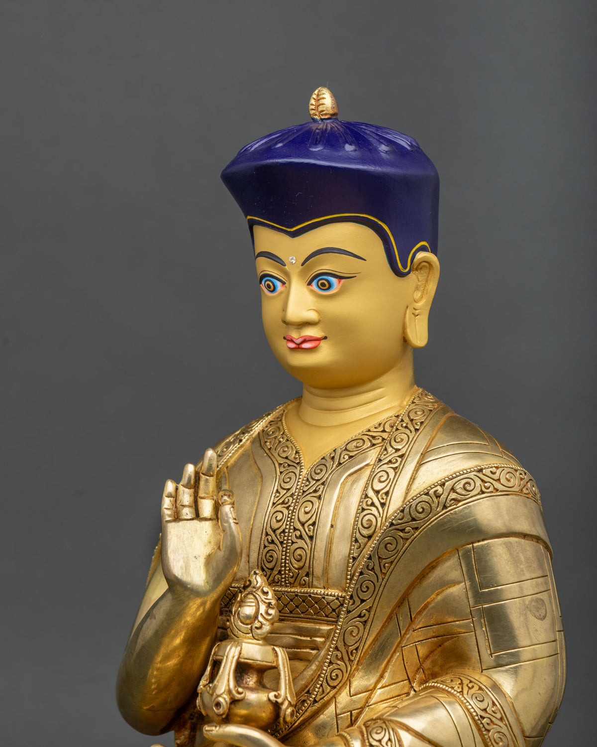 Tsangpa Gyare Statue side close-up, Vitarka Mudra hand gesture detail