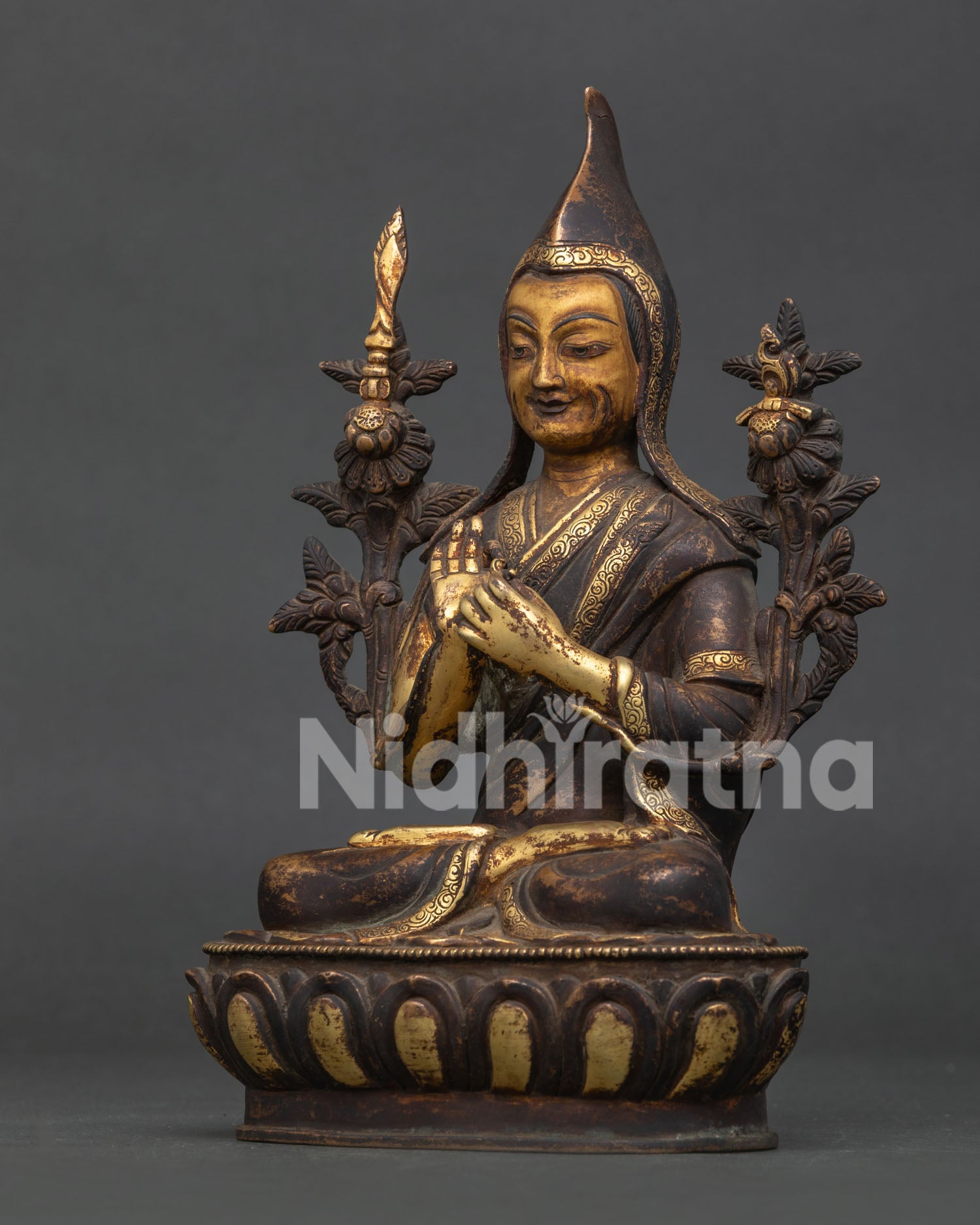 Tsongkhapa Statue Vajra Posture Lotus Stems Wisdom Symbols Side View.