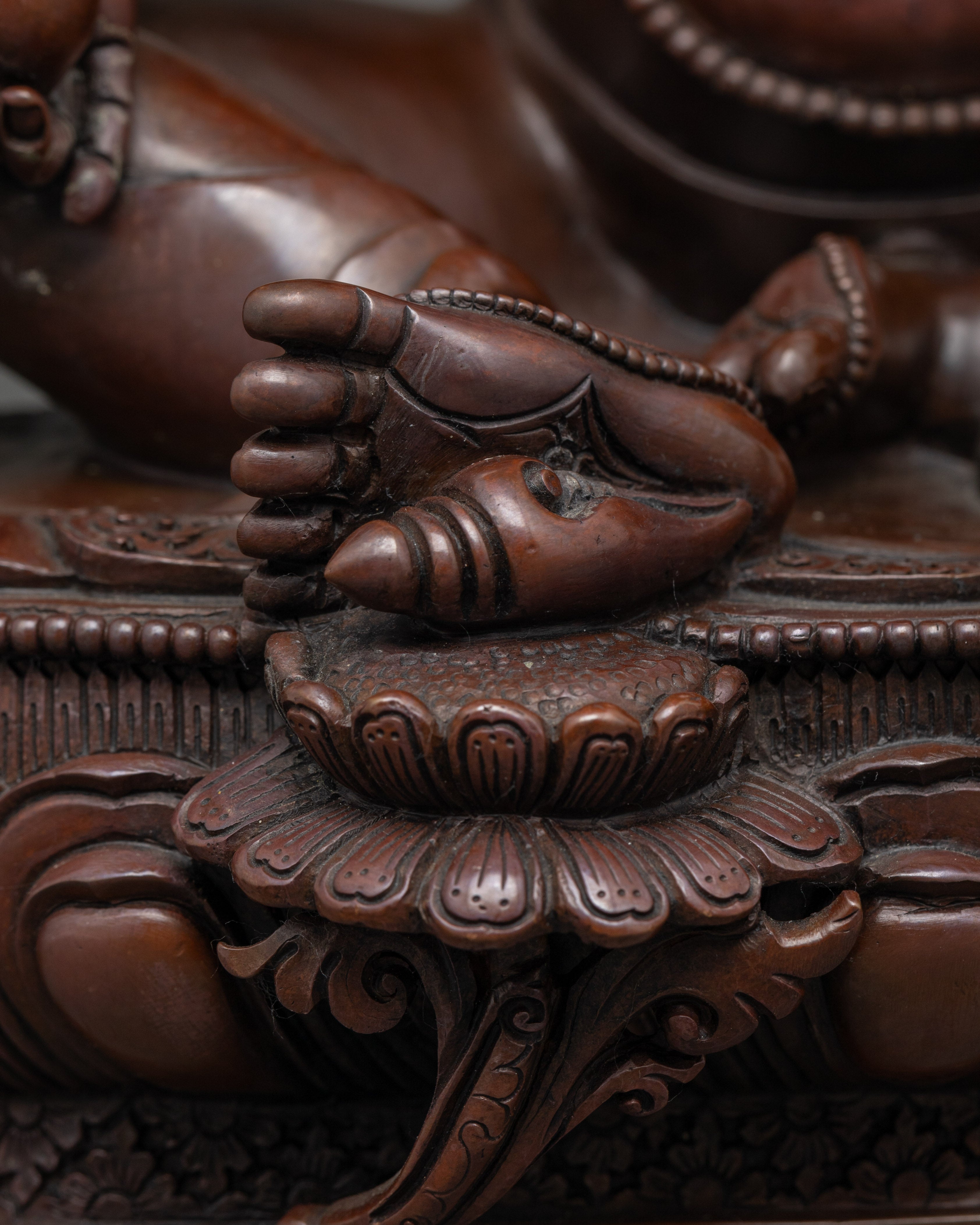 Oxidized Dzambhala Statue: Radiating Fortune and Prosperity