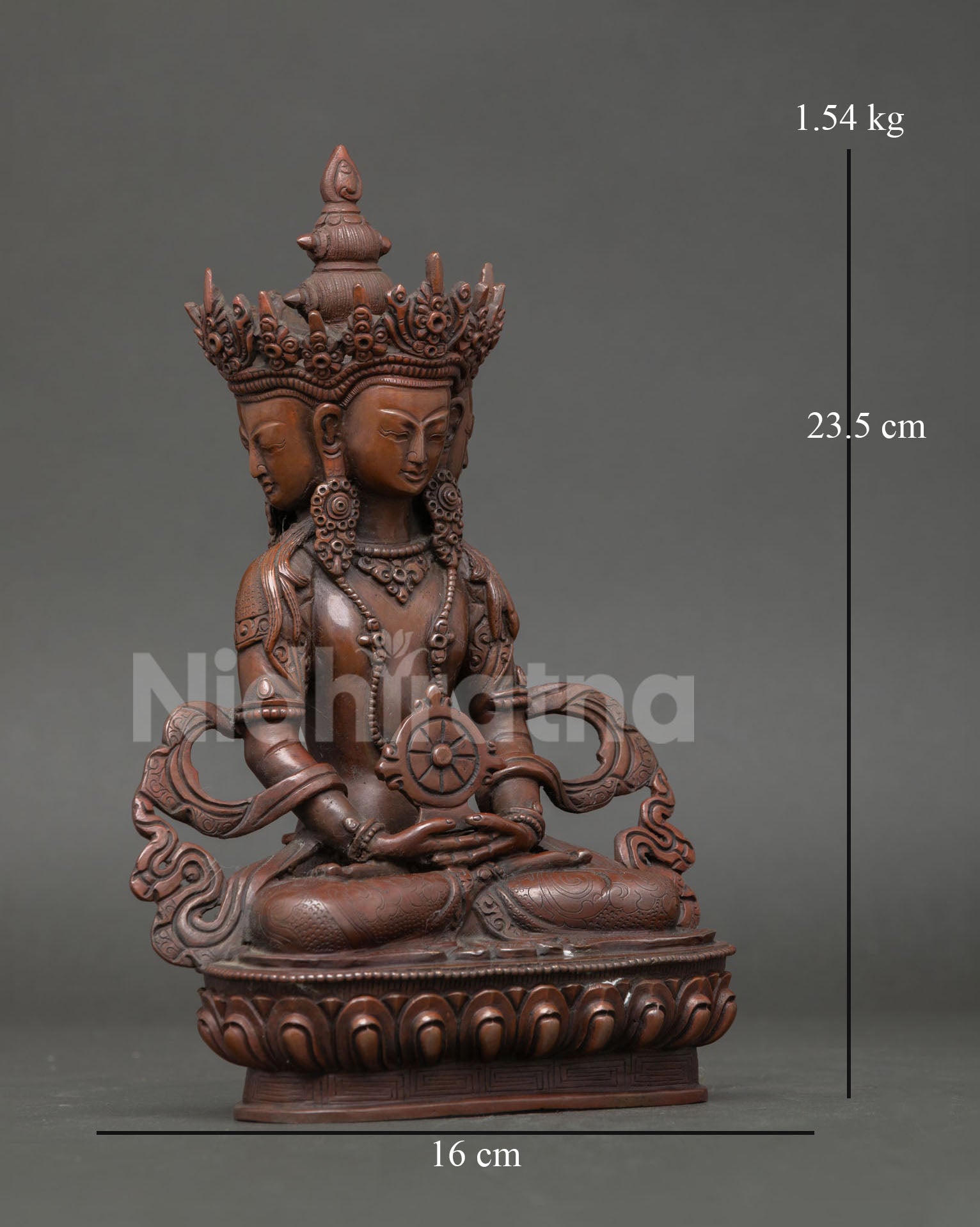 Vairocana Buddha copper statue close-up, jeweled ornaments, sacred motifs, oxidized finish, handmade Nepal