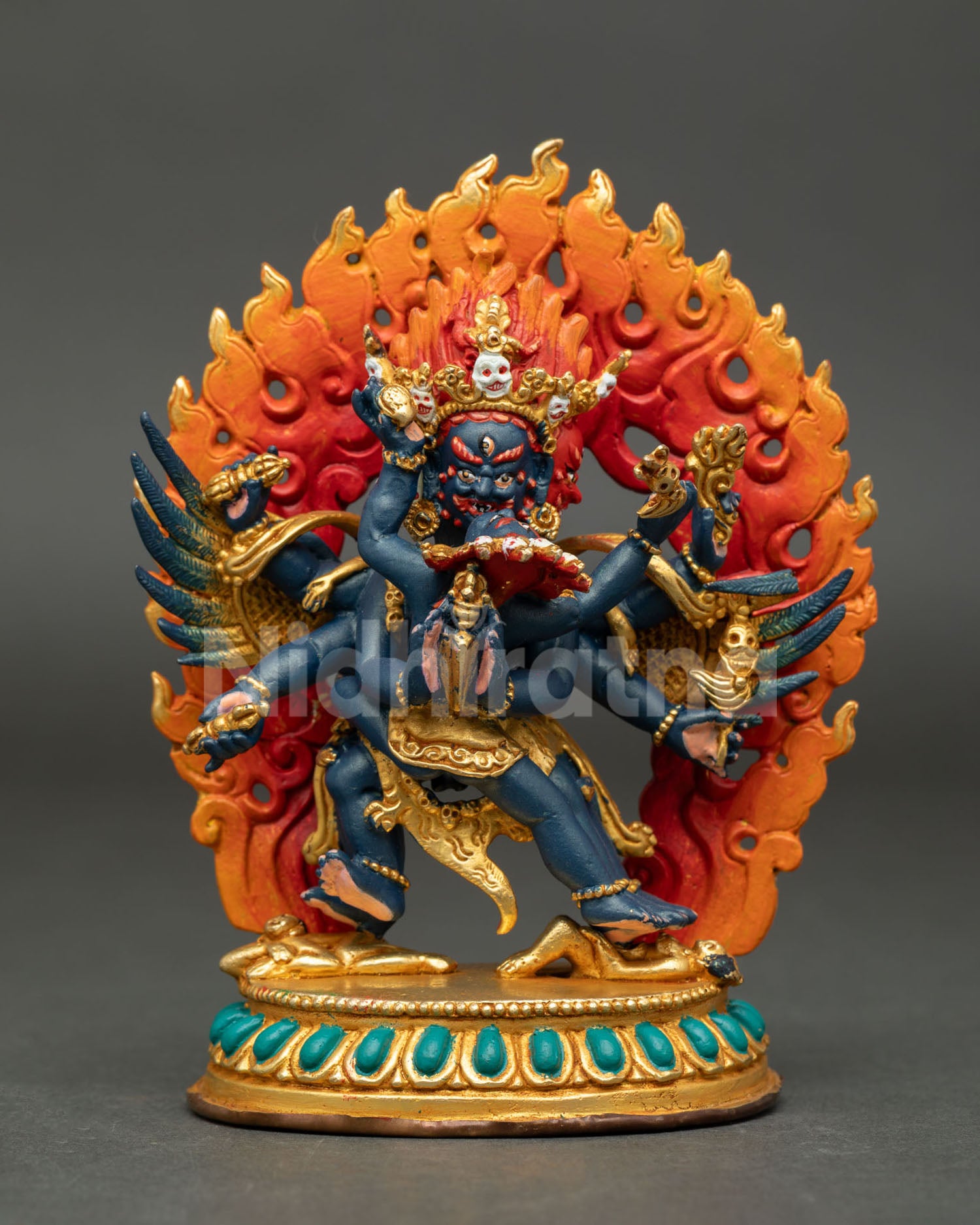 Vajrakilaya Statue from Nepal with gold gilded copper body, acrylic details, and lotus throne.