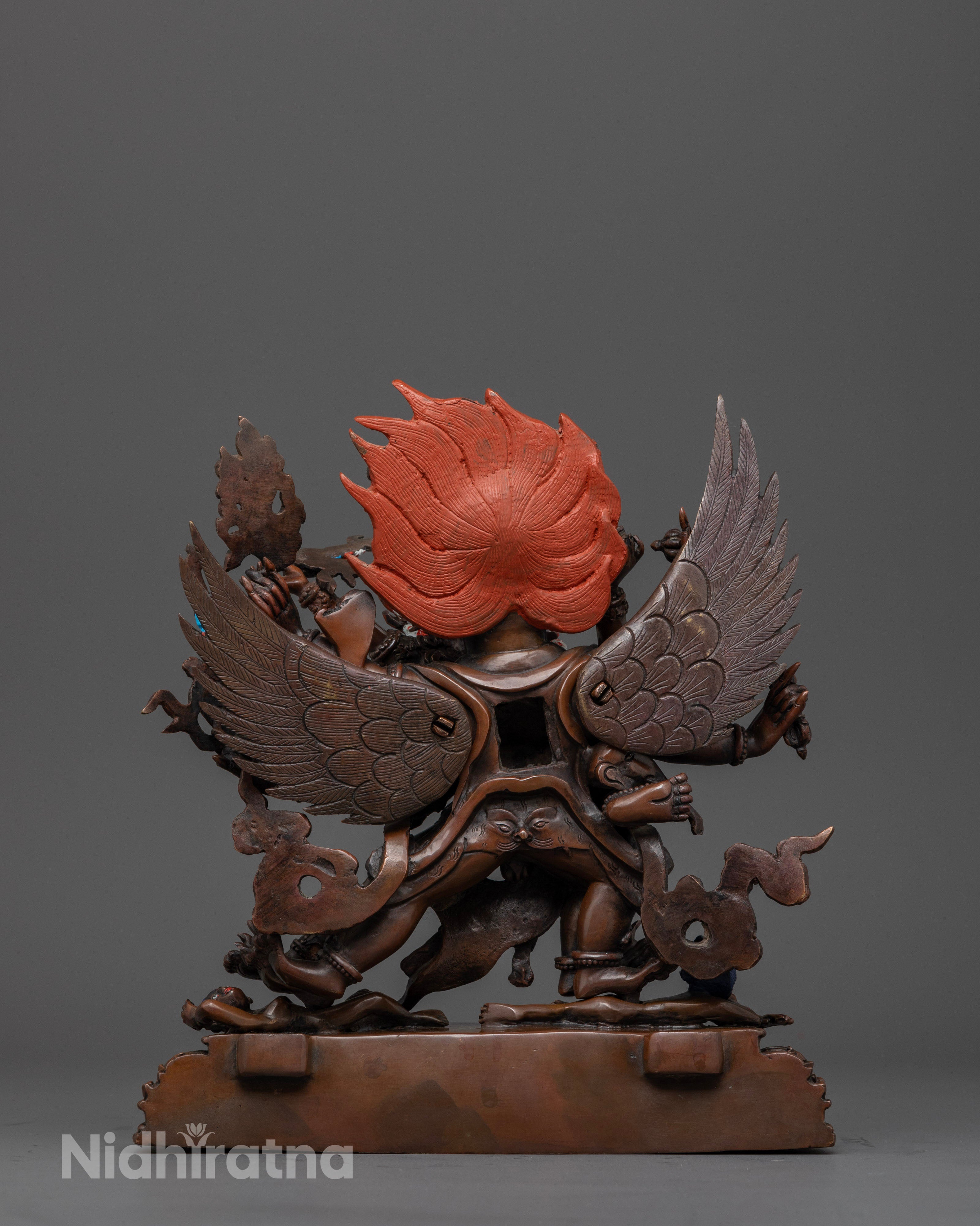 back view of vajrakilaya statue in yab yum form