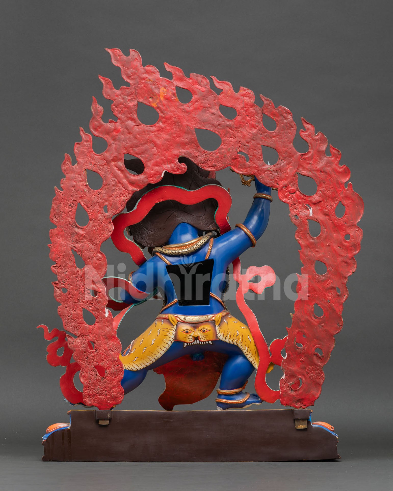 Vajrapani statue back view showing ornate silk scarves, fiery aureole and detailed jewelry