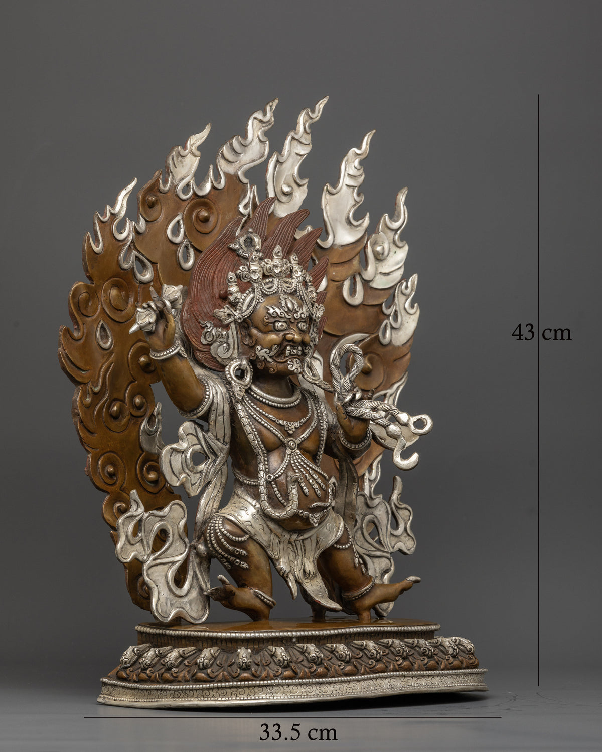 Vajrapani statue standing on lotus seat with blazing halo vajra and lasso.
