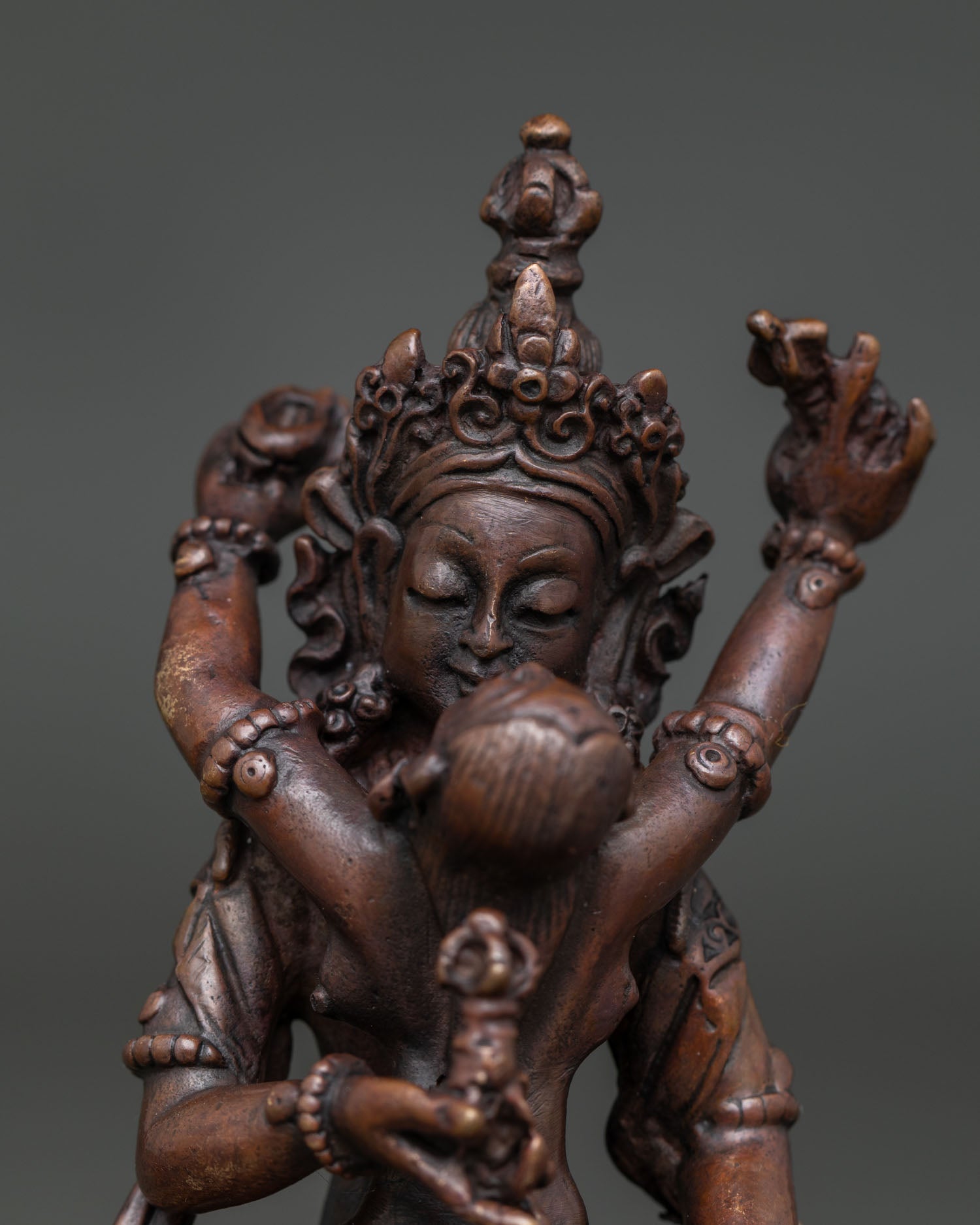 Vajrasattva and consort yab yum statue holding vajra bell kartika and kapala.