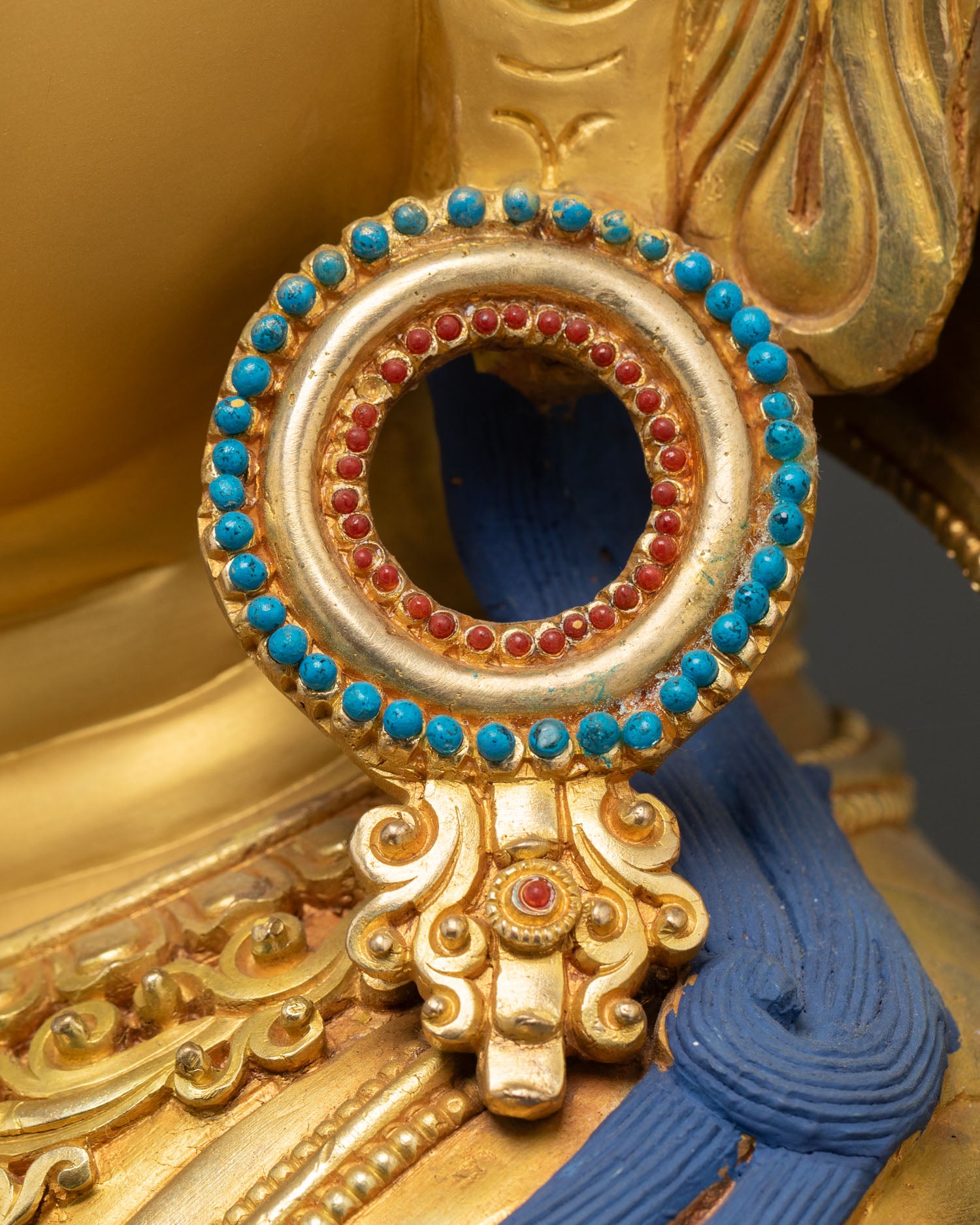 Vajrasattva circular earring detail turquoise beaded coral inlay Newar craftsmanship