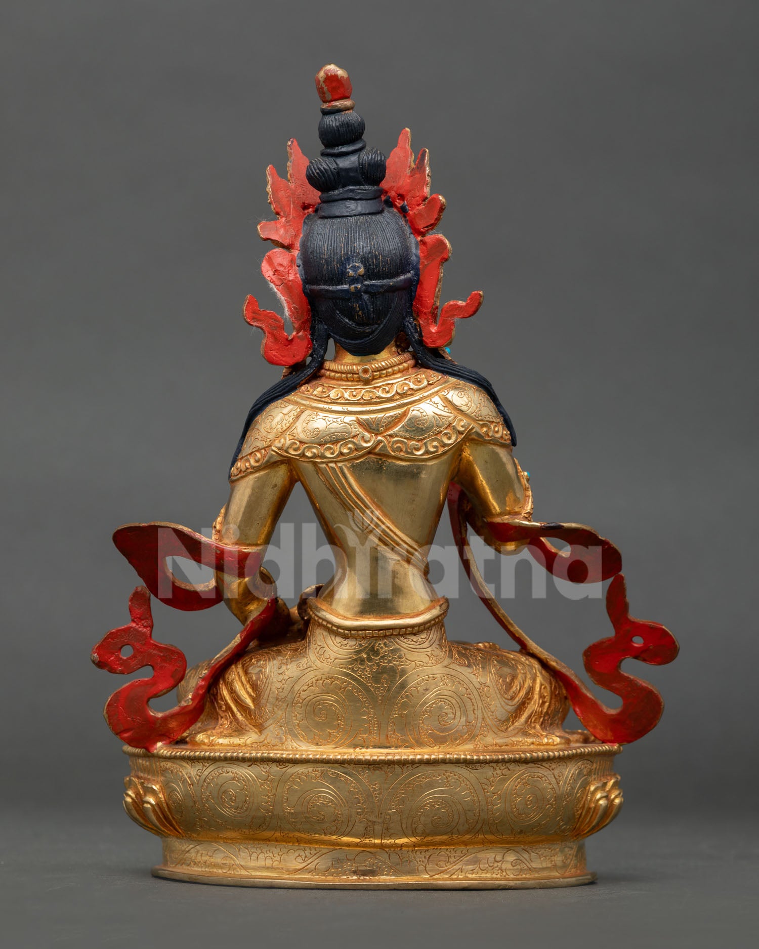 Vajrasattva statue back view, handcrafted copper finish with engraved lotus throne detailing