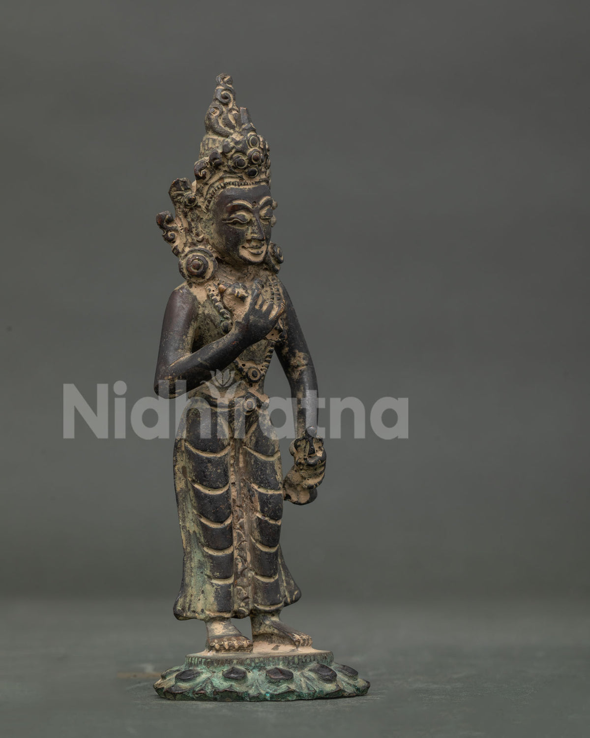 Vajrasattva statue holding vajra at heart and bell in left hand copper sculpture.