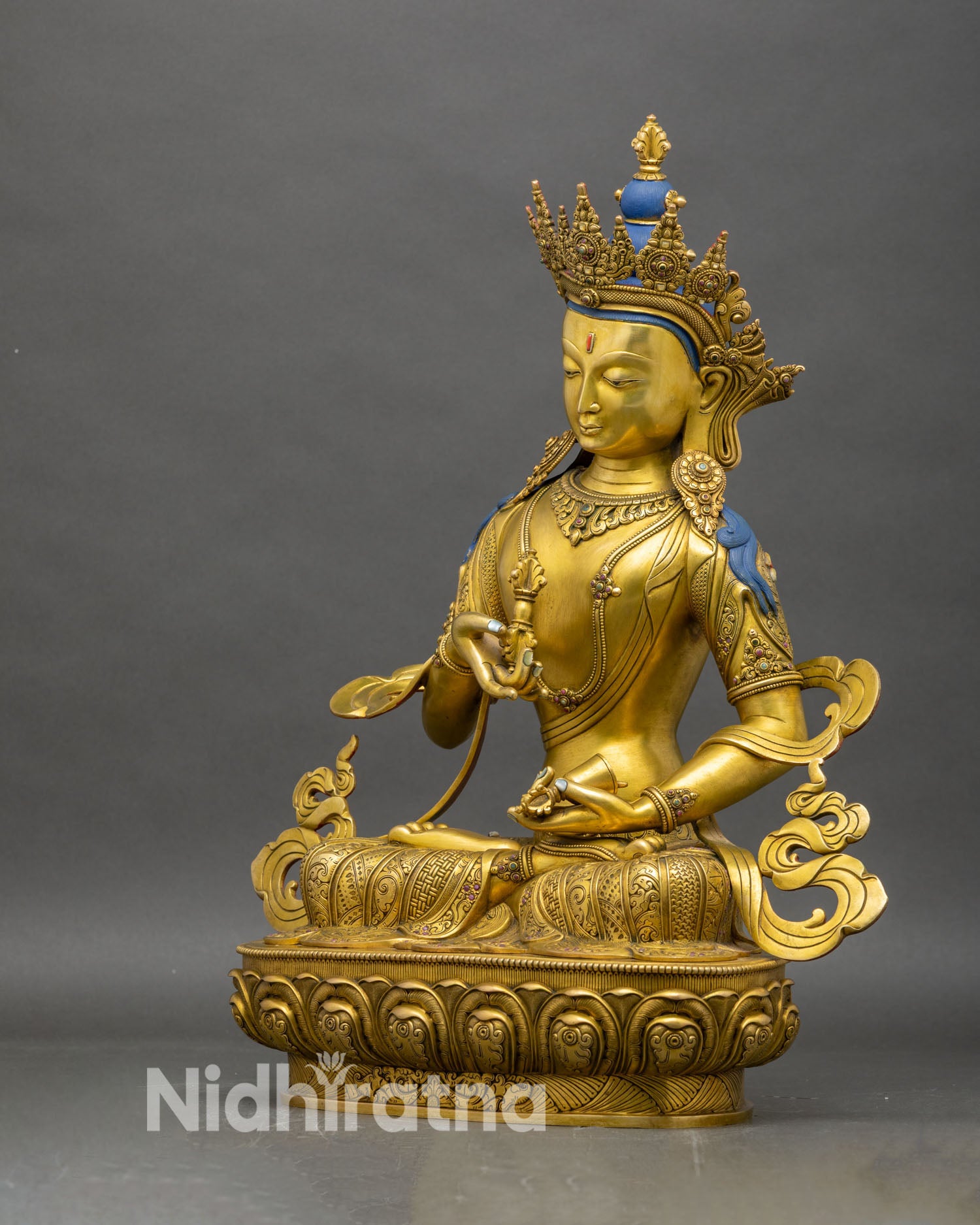 Left profile of Vajrasattva statue, Himalayan lost-wax cast copper with 24K gold gilding