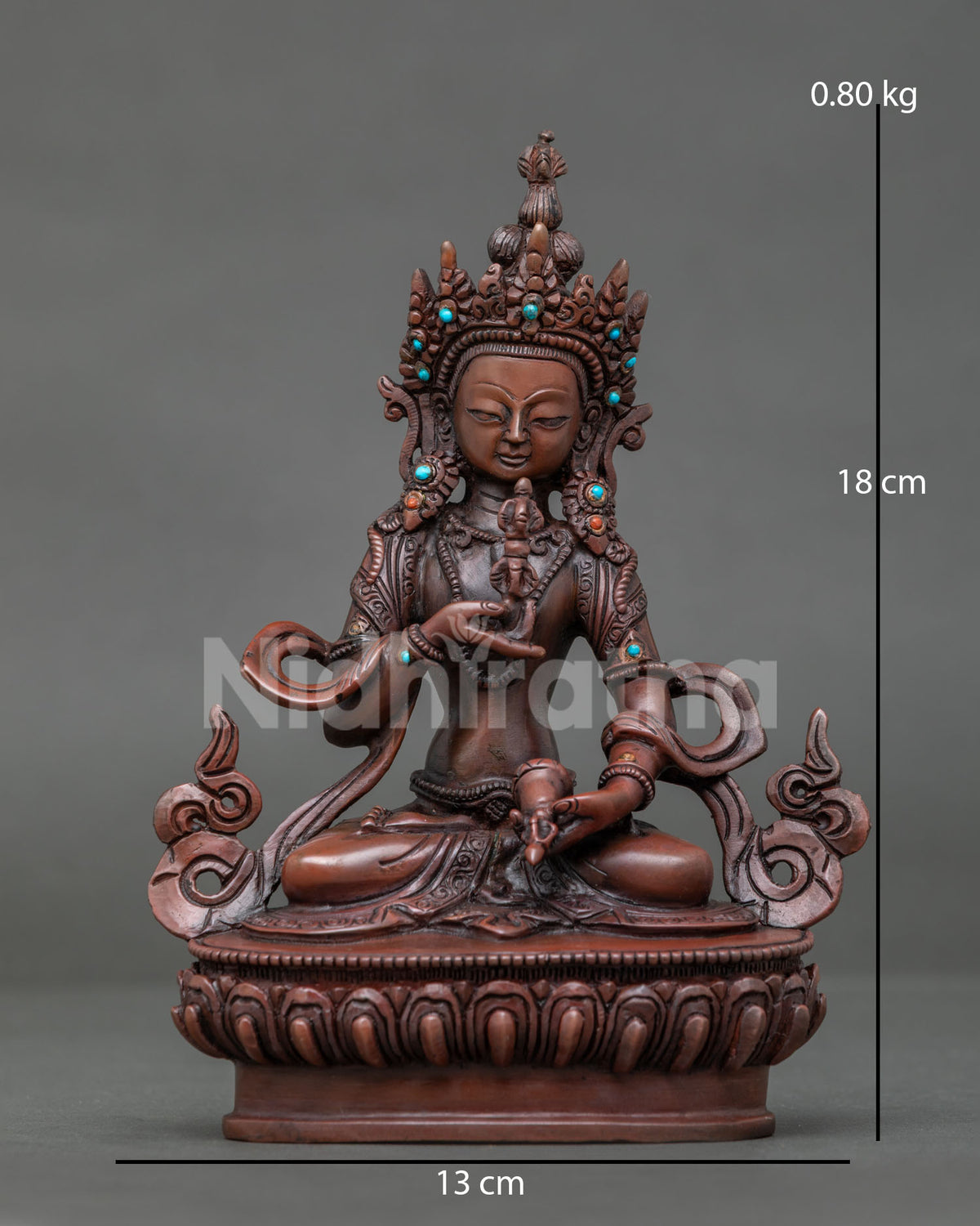 Vajrasattva statue seated on lotus throne with oxidized copper finish and semi precious stones.