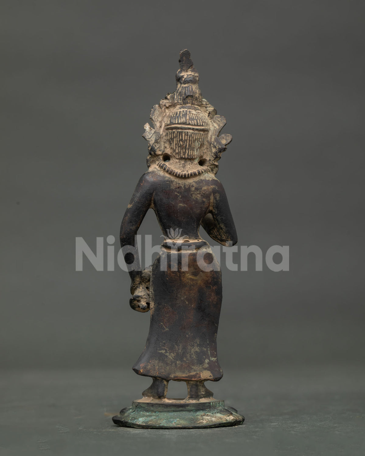 Vajrasattva statue showing intricate nepalese copper craftsmanship.
