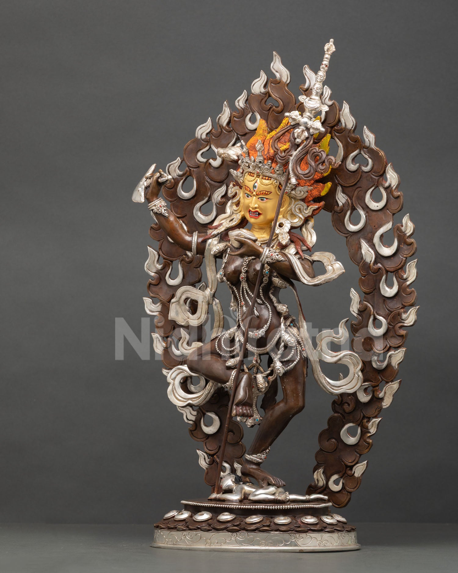 Vajravarahi Dorje Phagmo statue left side view detailed oxidized copper finish ritual weapons garland fifty heads art