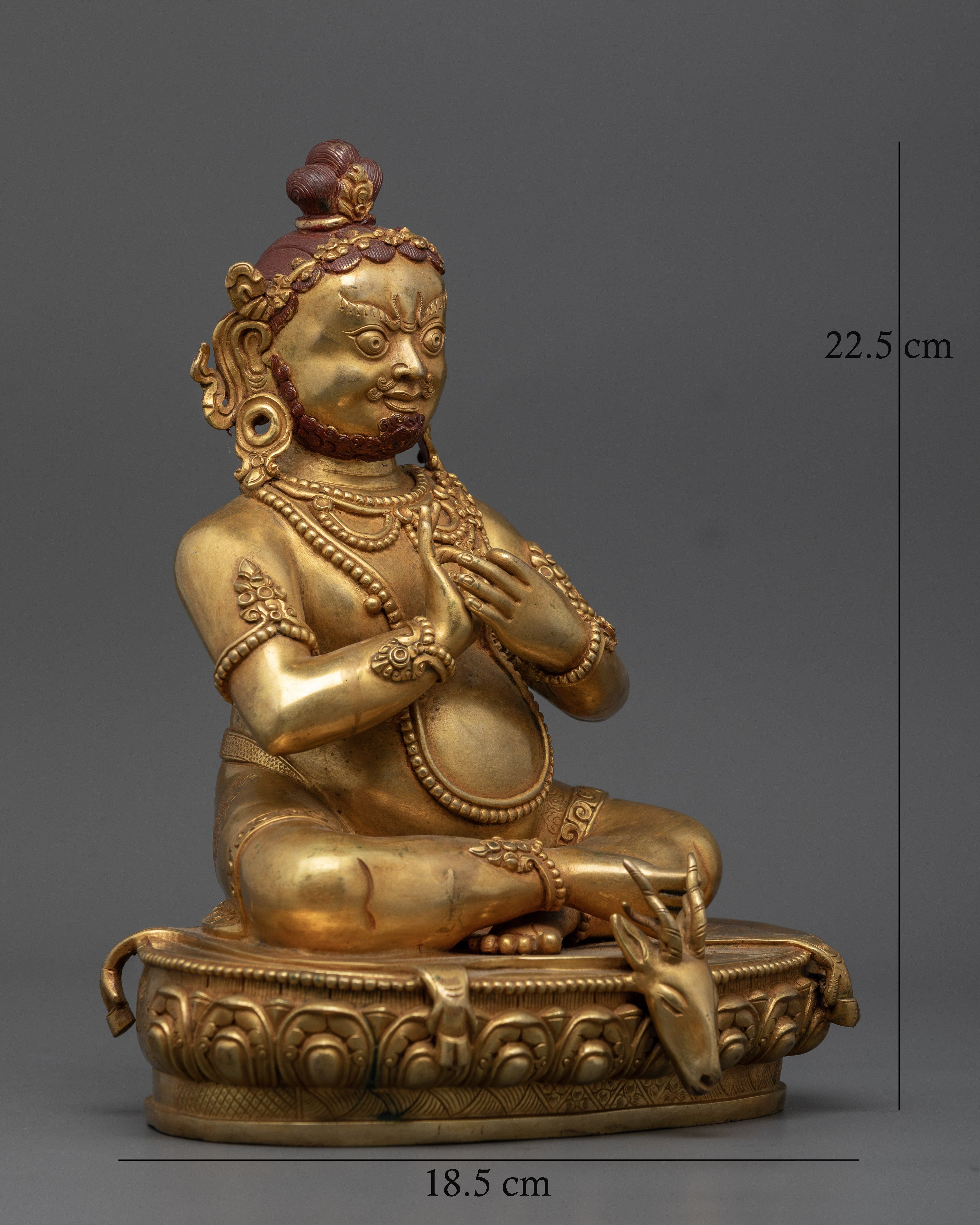 Virupa Mahasiddha seated on carved lotus throne with deer skin