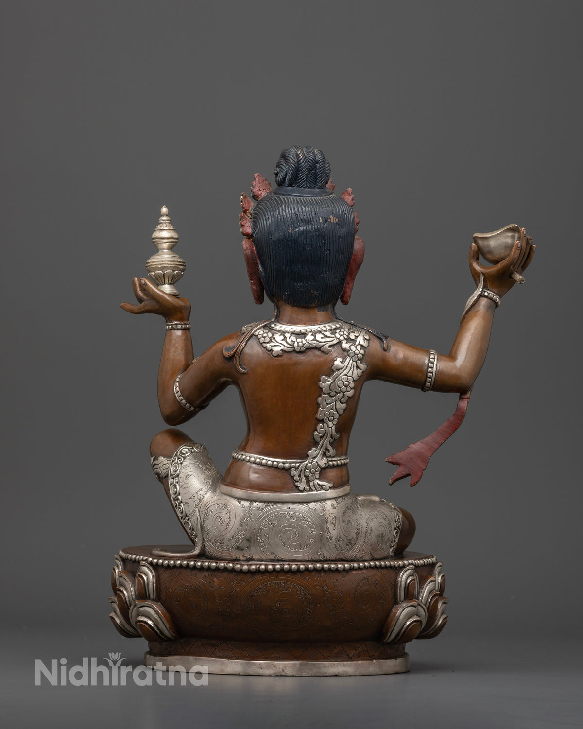 Virupaksha guardian king sculpture with intricate details and traditional Nepalese metalwork
