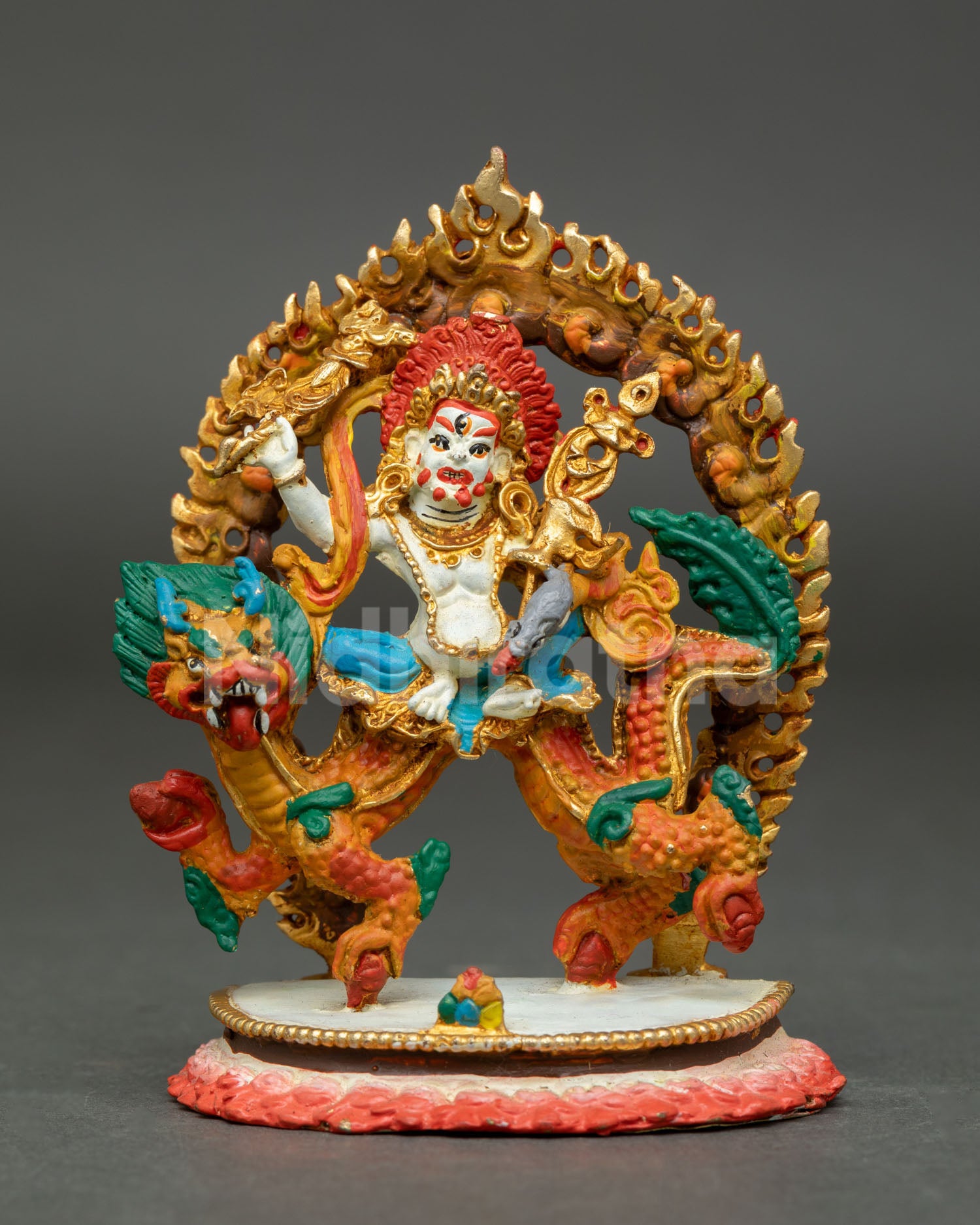 White Dzambhala Buddhist statue featuring dragon support lotus pedestal and sacred symbols of prosperity and protection.