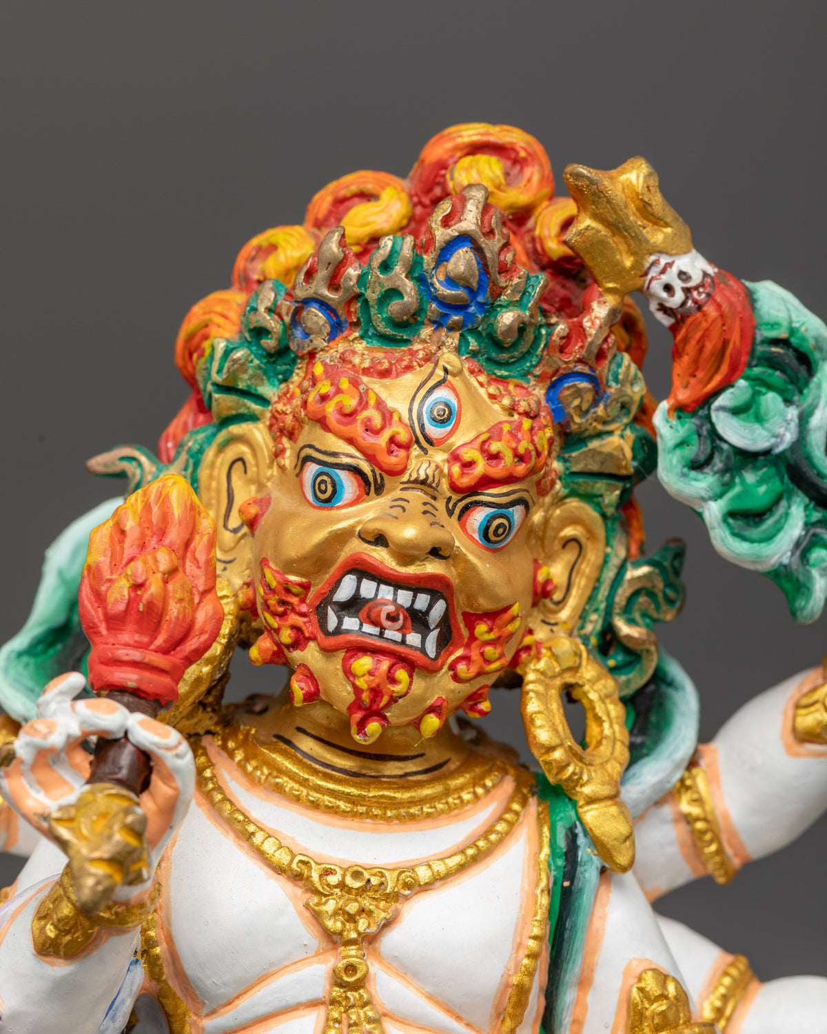 White Mahakala Buddhist statue with 24K gold painted face and lotus seat