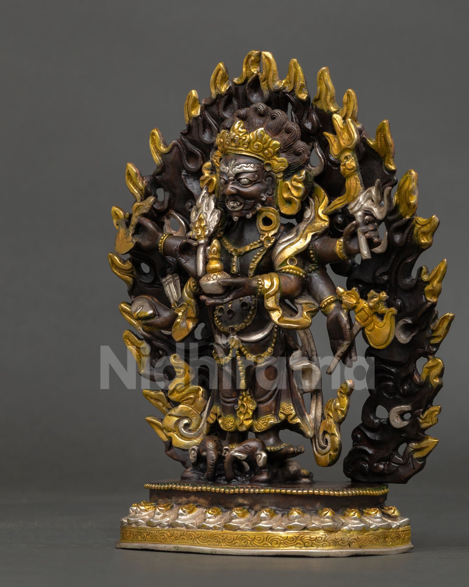 White Mahakala statue left side view, oxidized copper Buddhist deity figurine Nepal